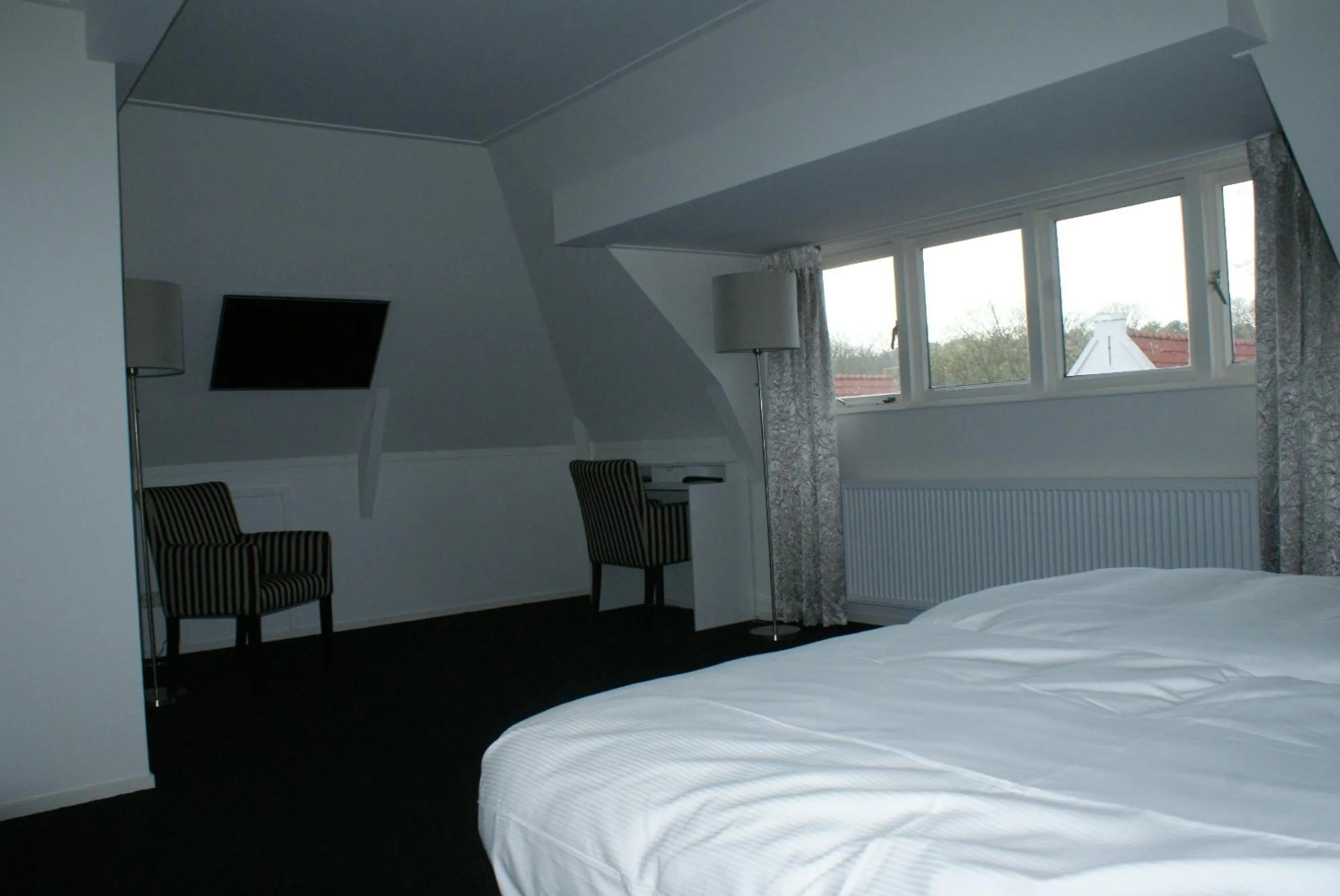 Photo of the whole room, Bed in De Herbergh van Flielant
