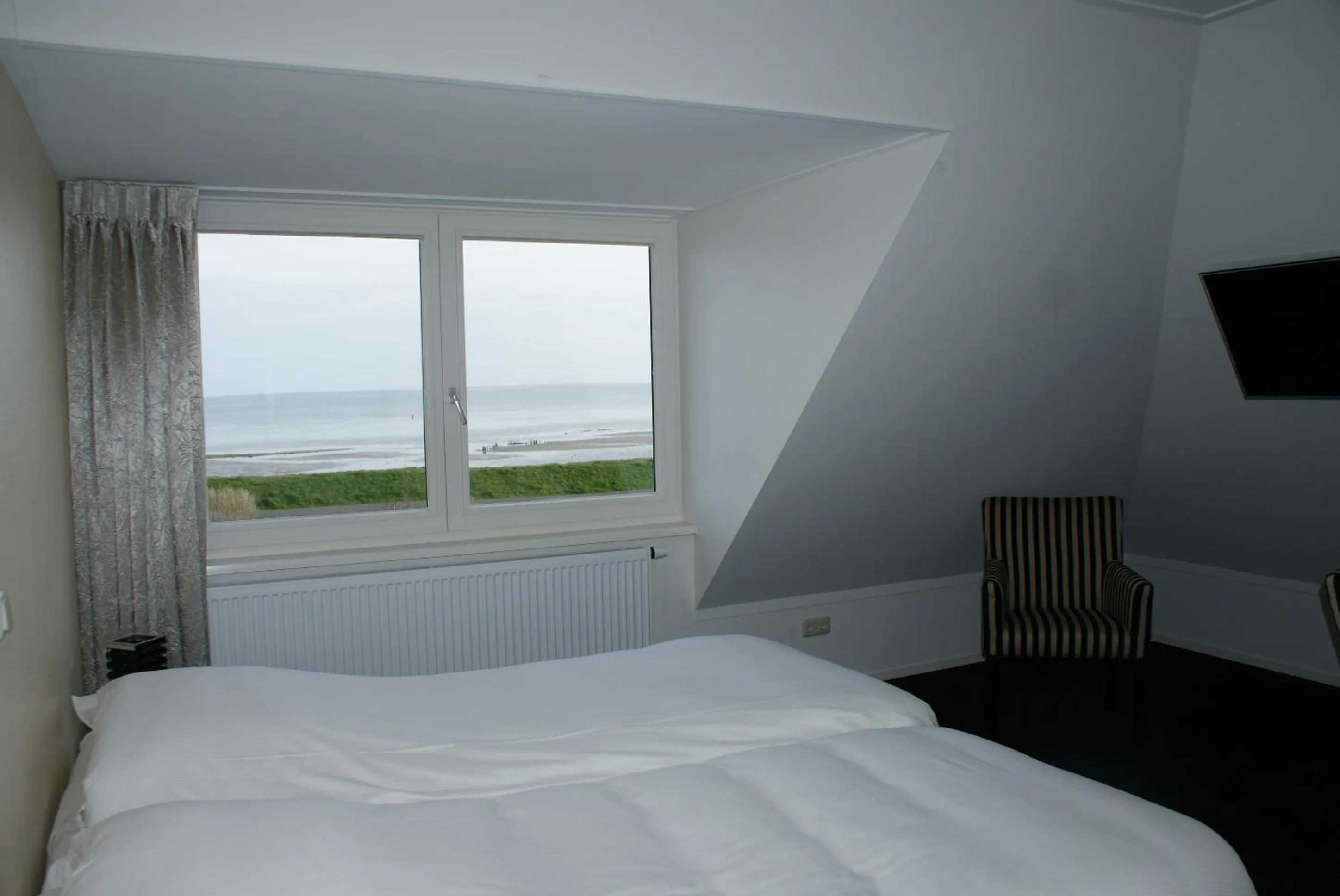 View (from property/room), Bed in De Herbergh van Flielant