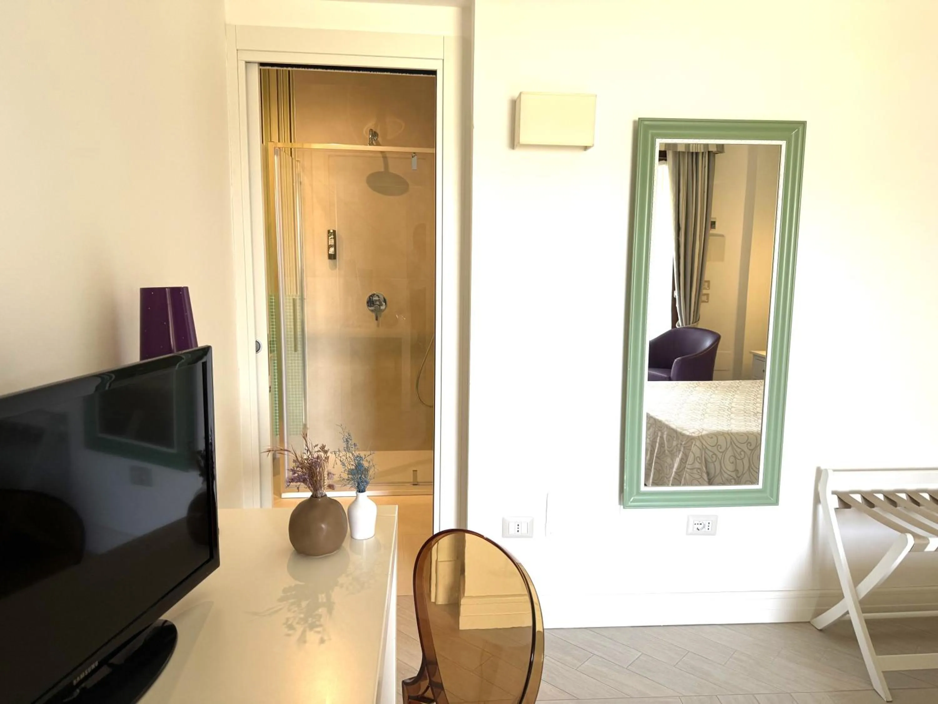 Bedroom in Hotel Residence Il Porto