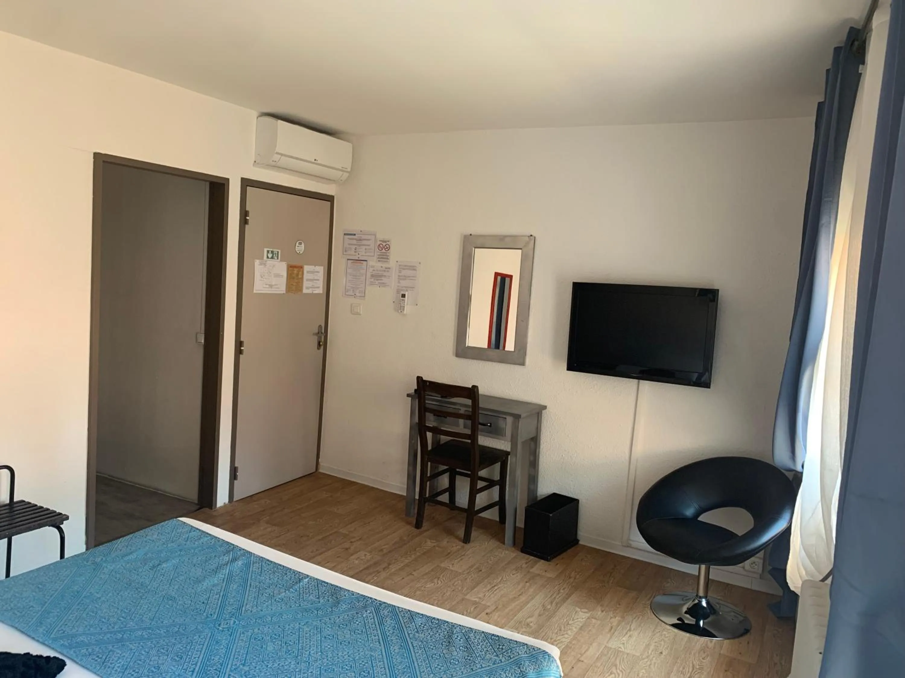 Bed in Le Cérétan Hôtel