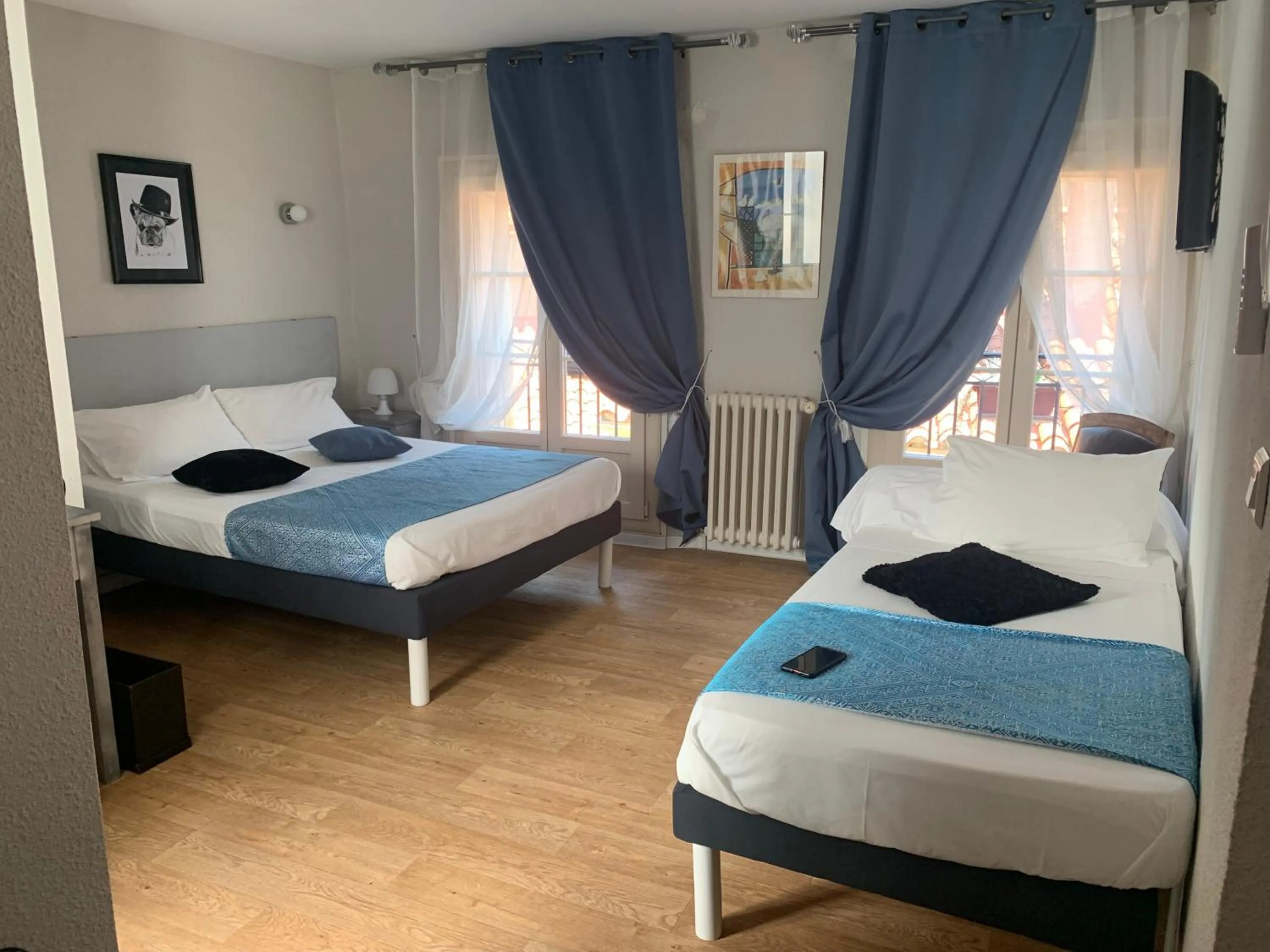 Bed in Le Cérétan Hôtel