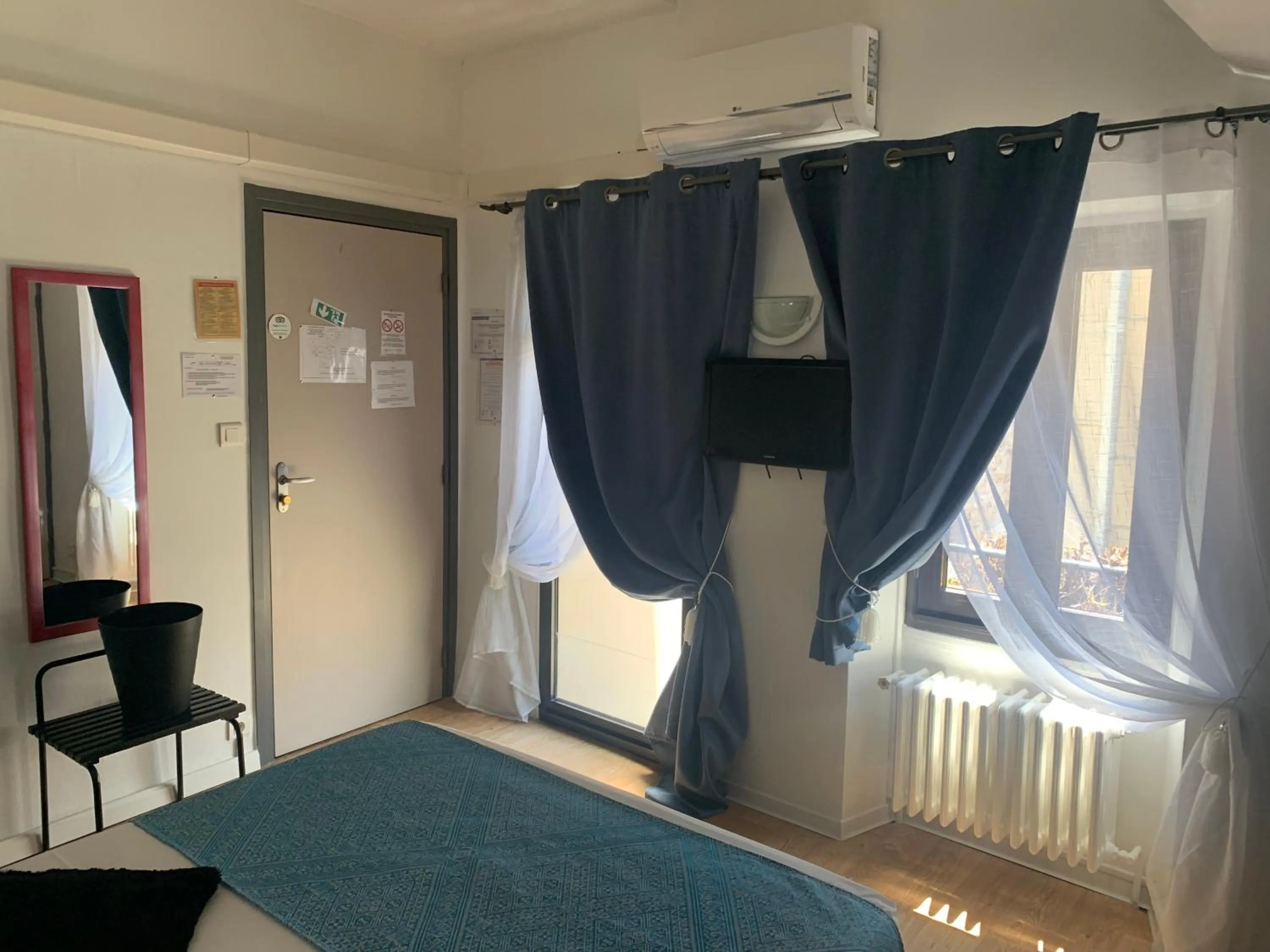 Bed in Le Cérétan Hôtel