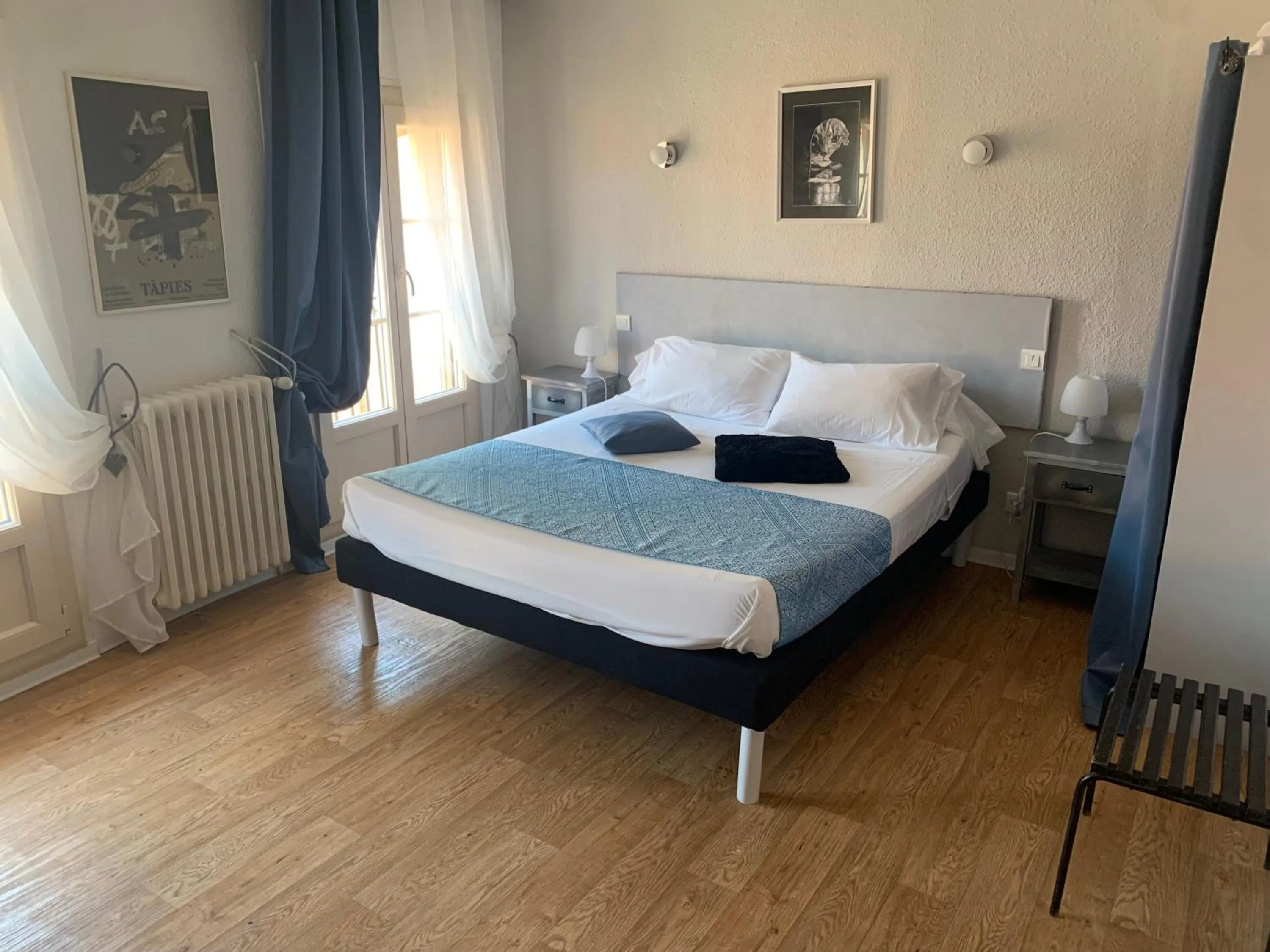 Bed in Le Cérétan Hôtel