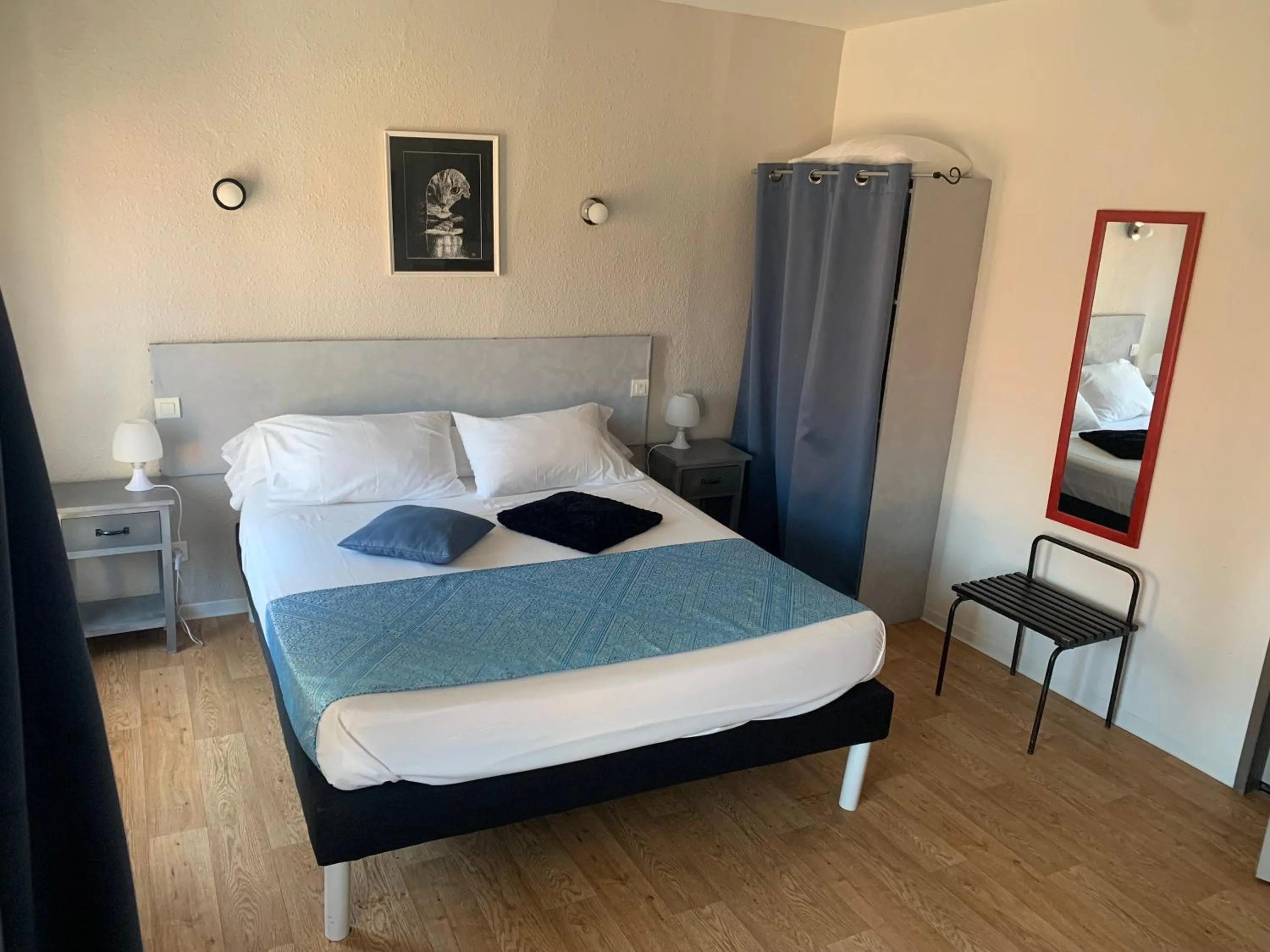 Bed in Le Cérétan Hôtel