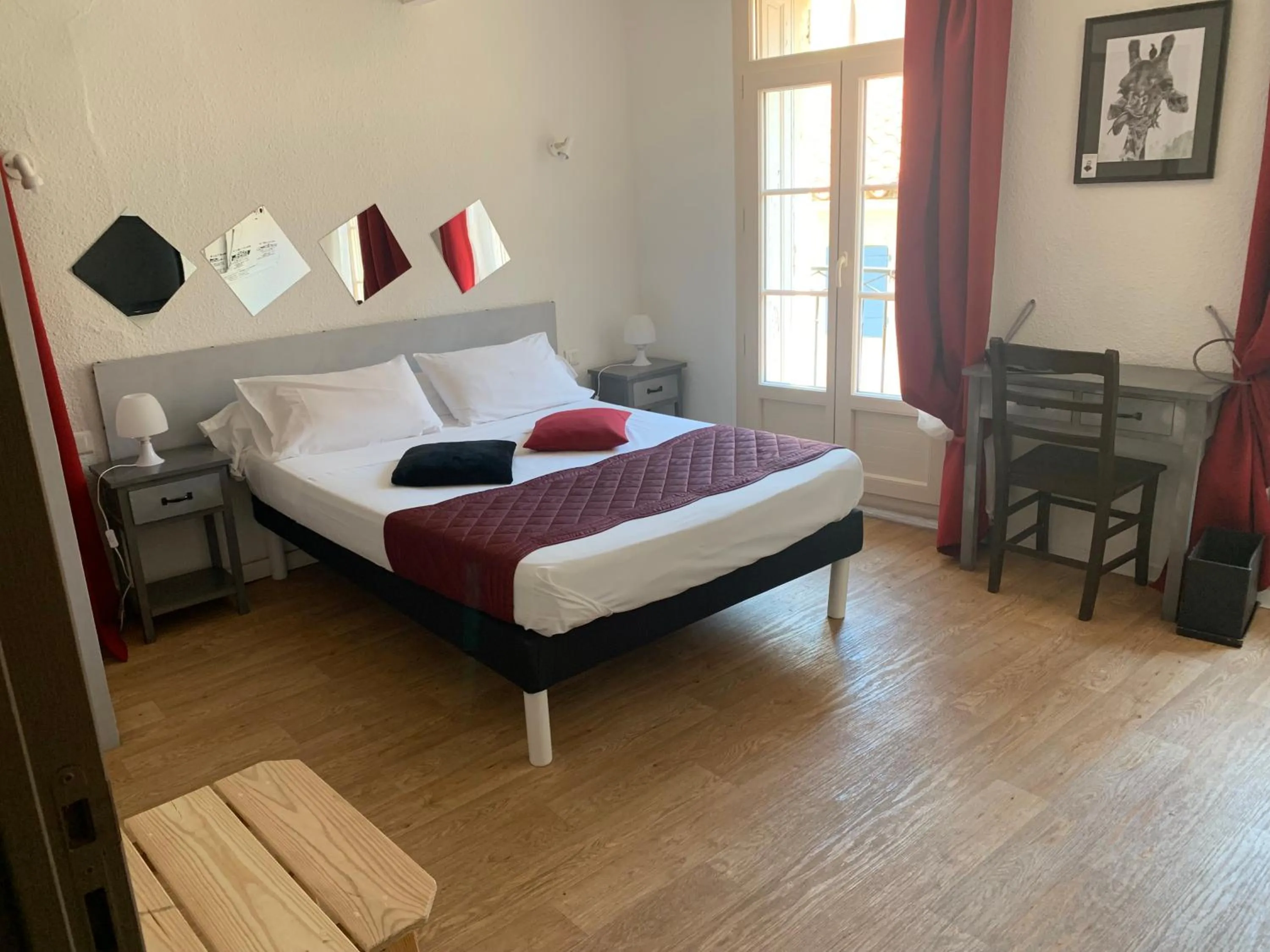 Bed in Le Cérétan Hôtel