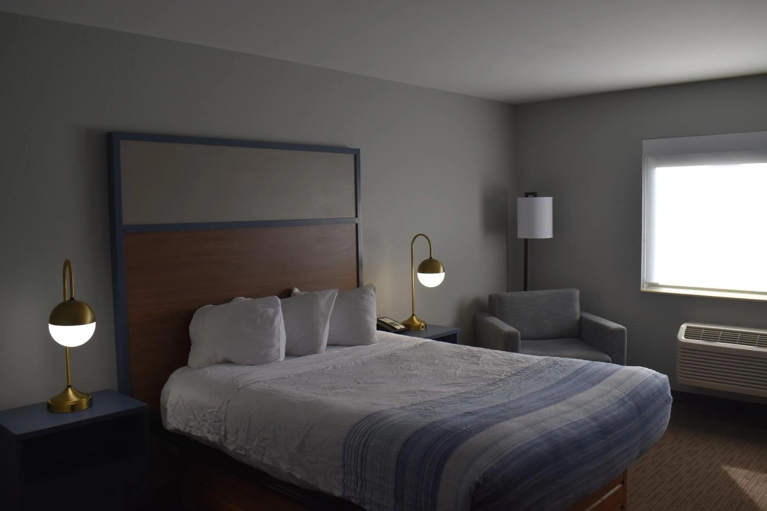 Bed in AmericInn by Wyndham Sioux City