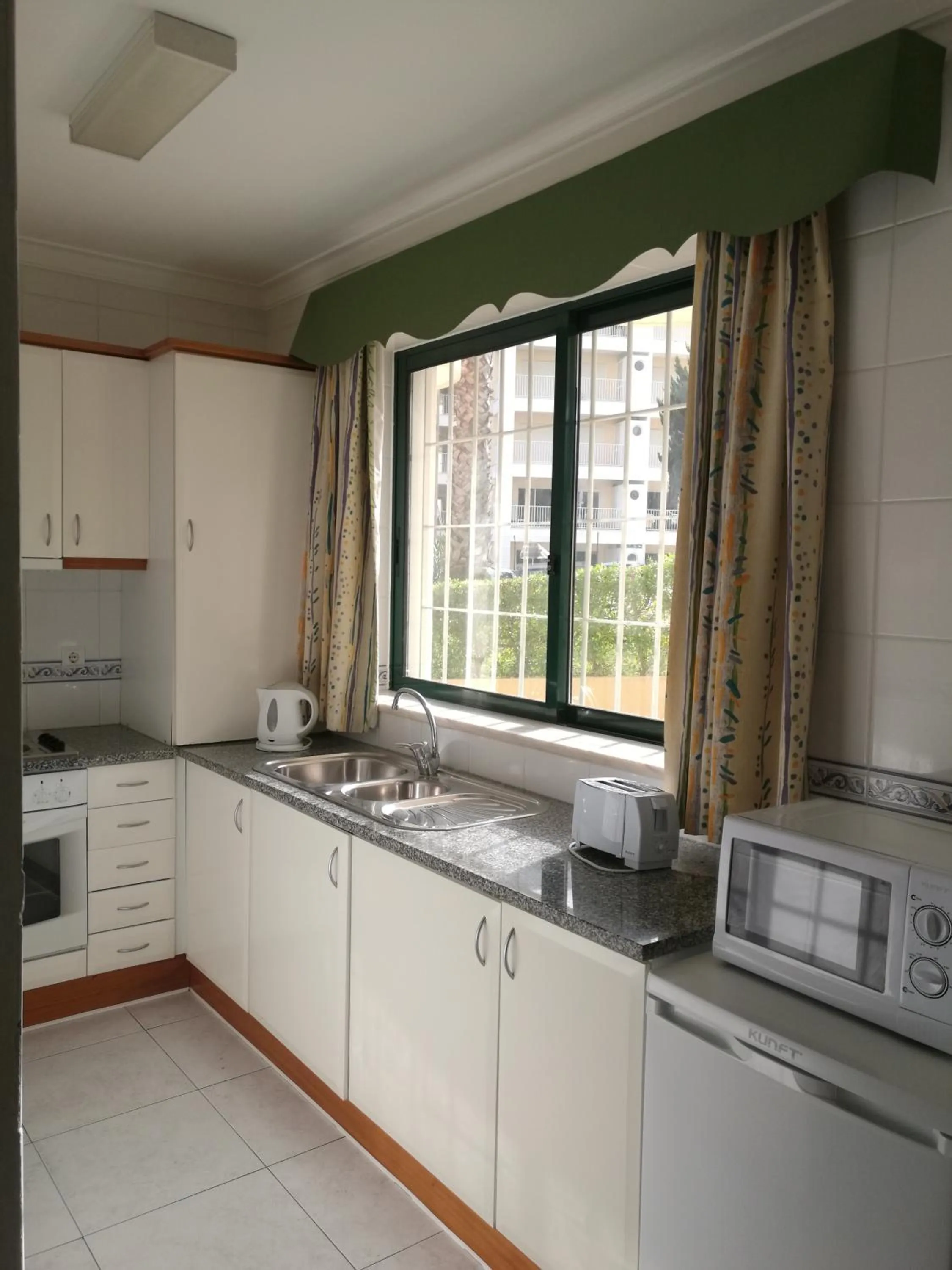 Kitchen or kitchenette in Plaza Real by Atlantichotels