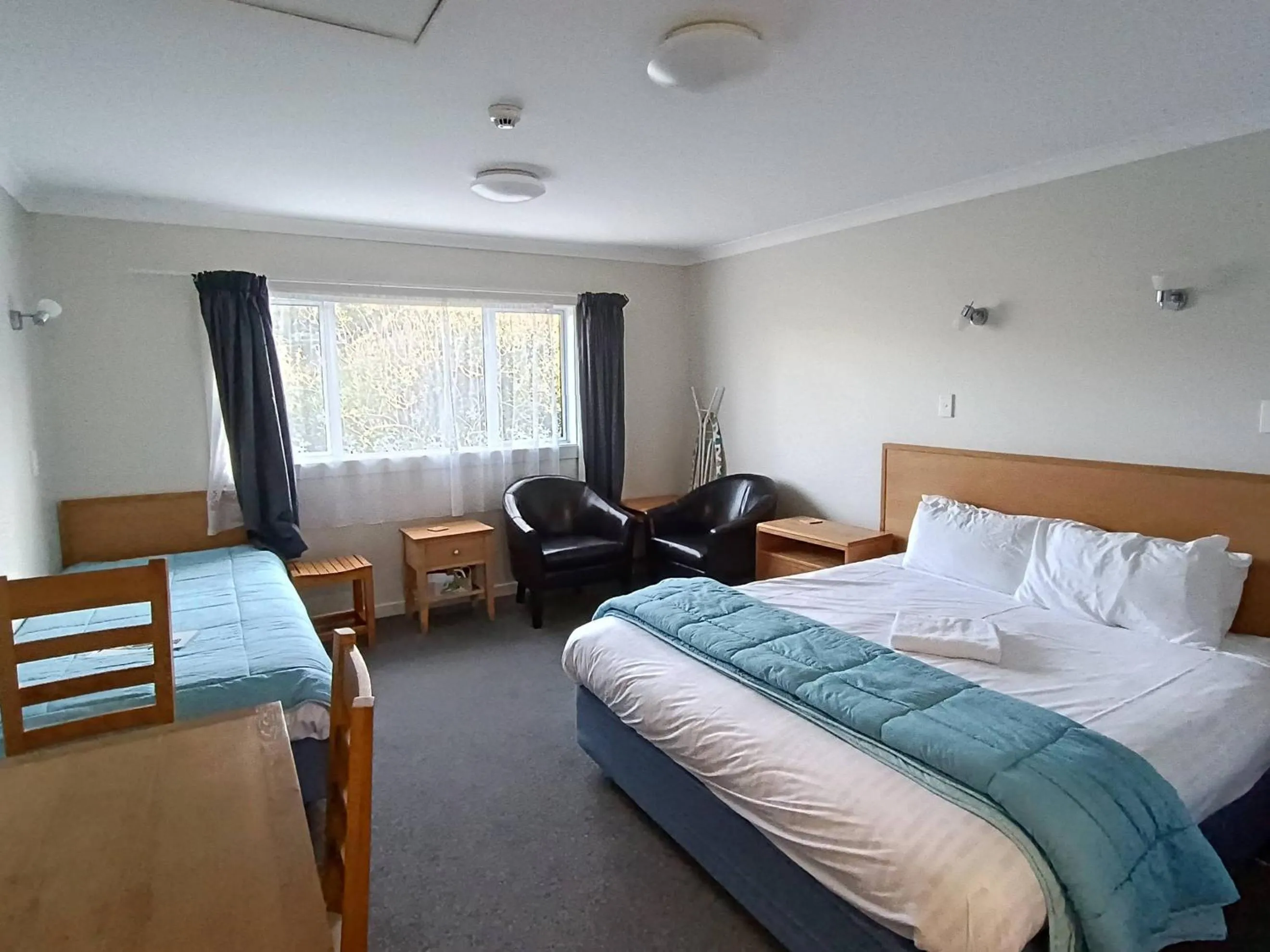 Bed in Bayfield Motel and Apartment