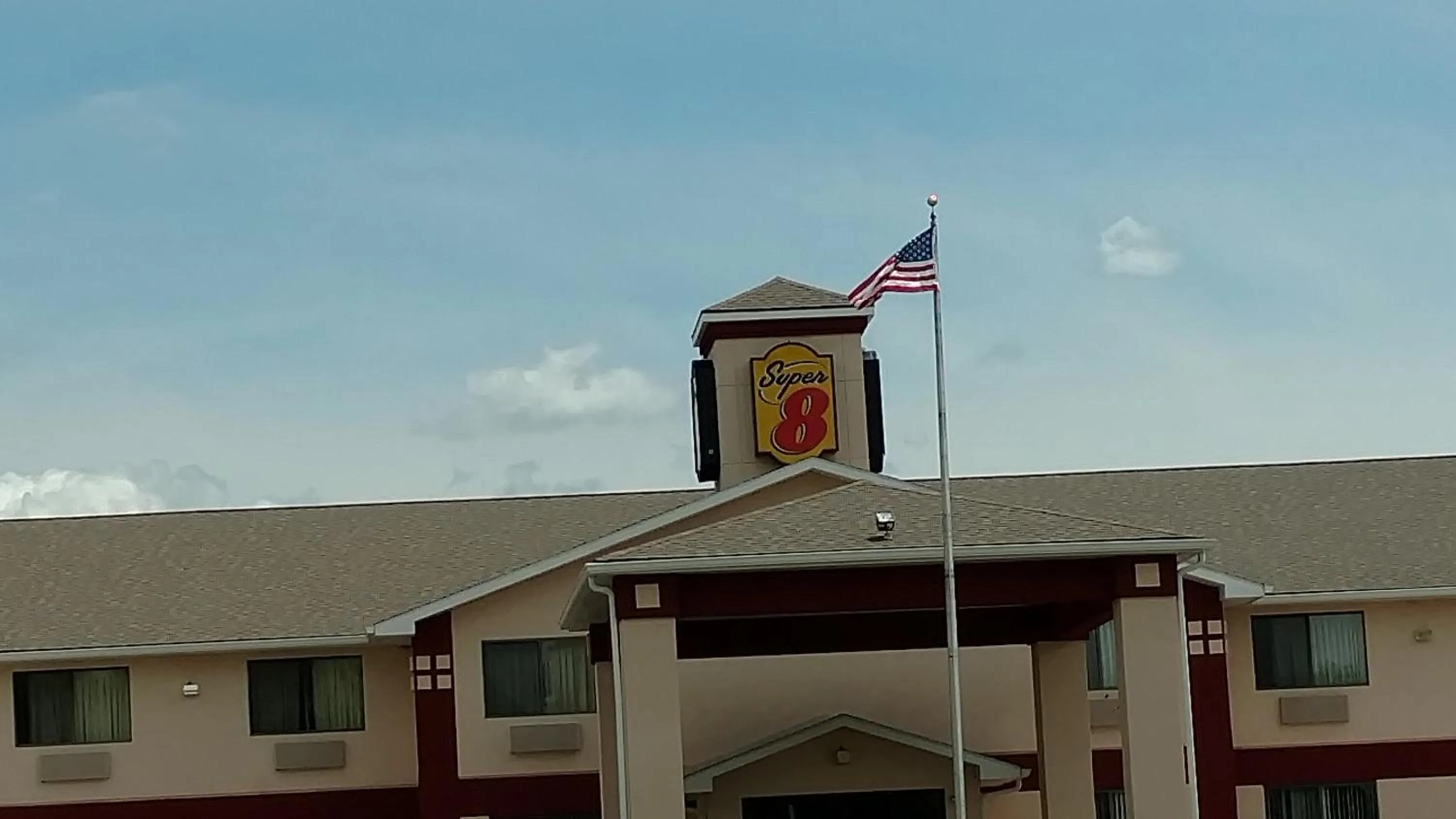 Property logo or sign in Super 8 by Wyndham Omaha Eppley Airport/Carter Lake