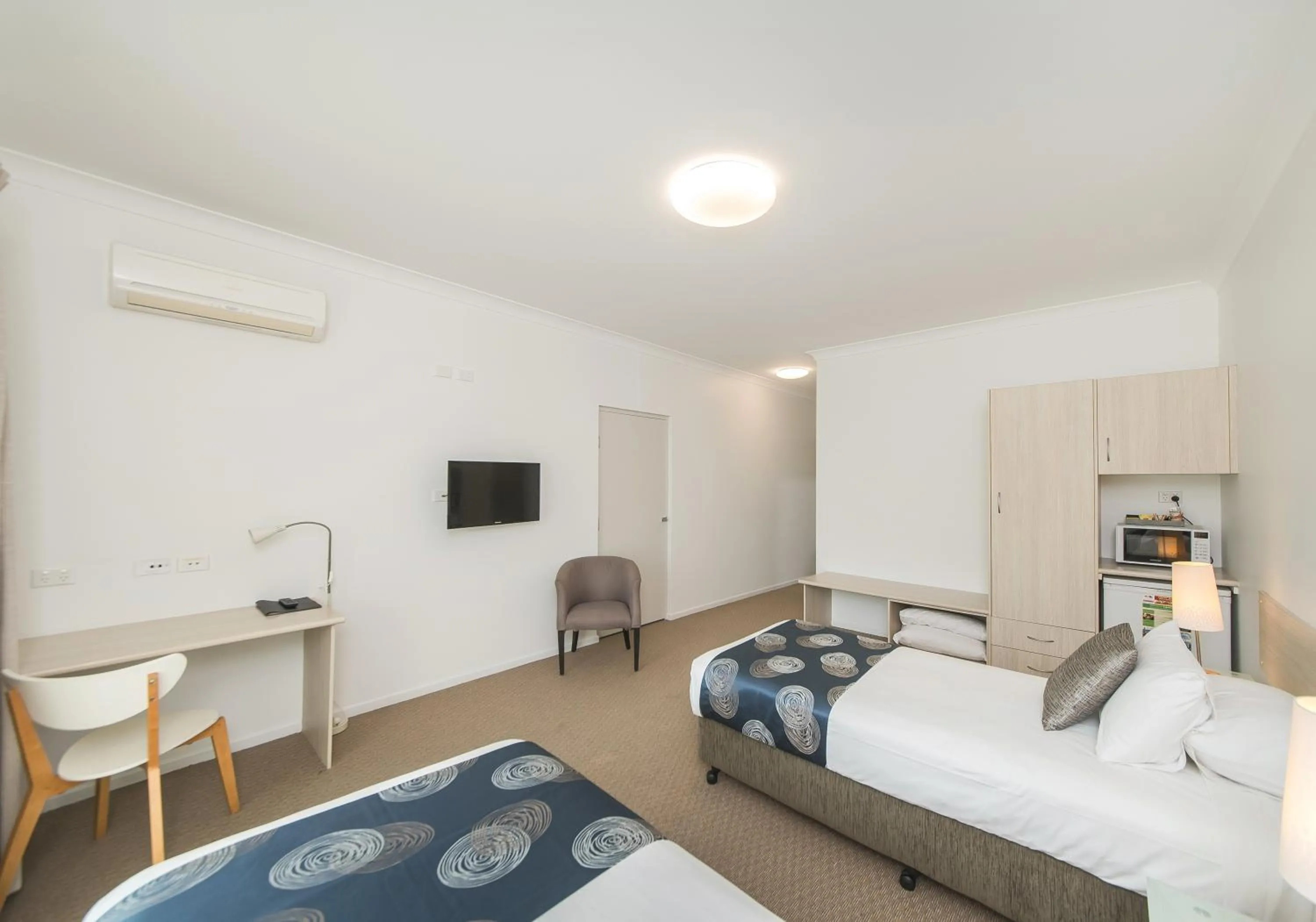 Bed in The Coast Motel