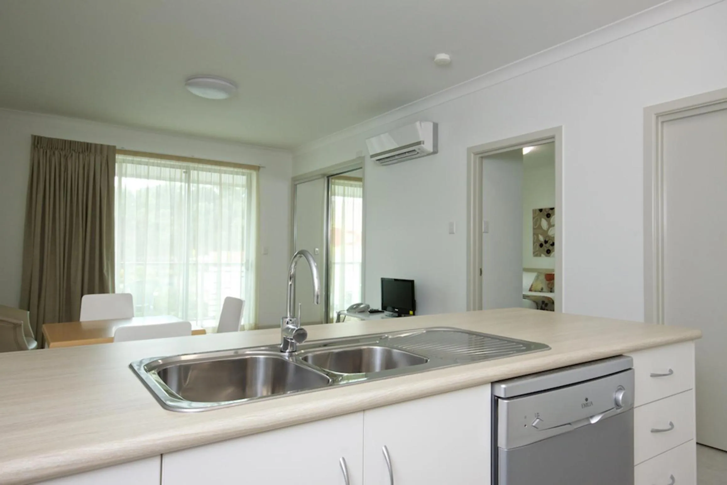 Kitchen or kitchenette in The Coast Motel