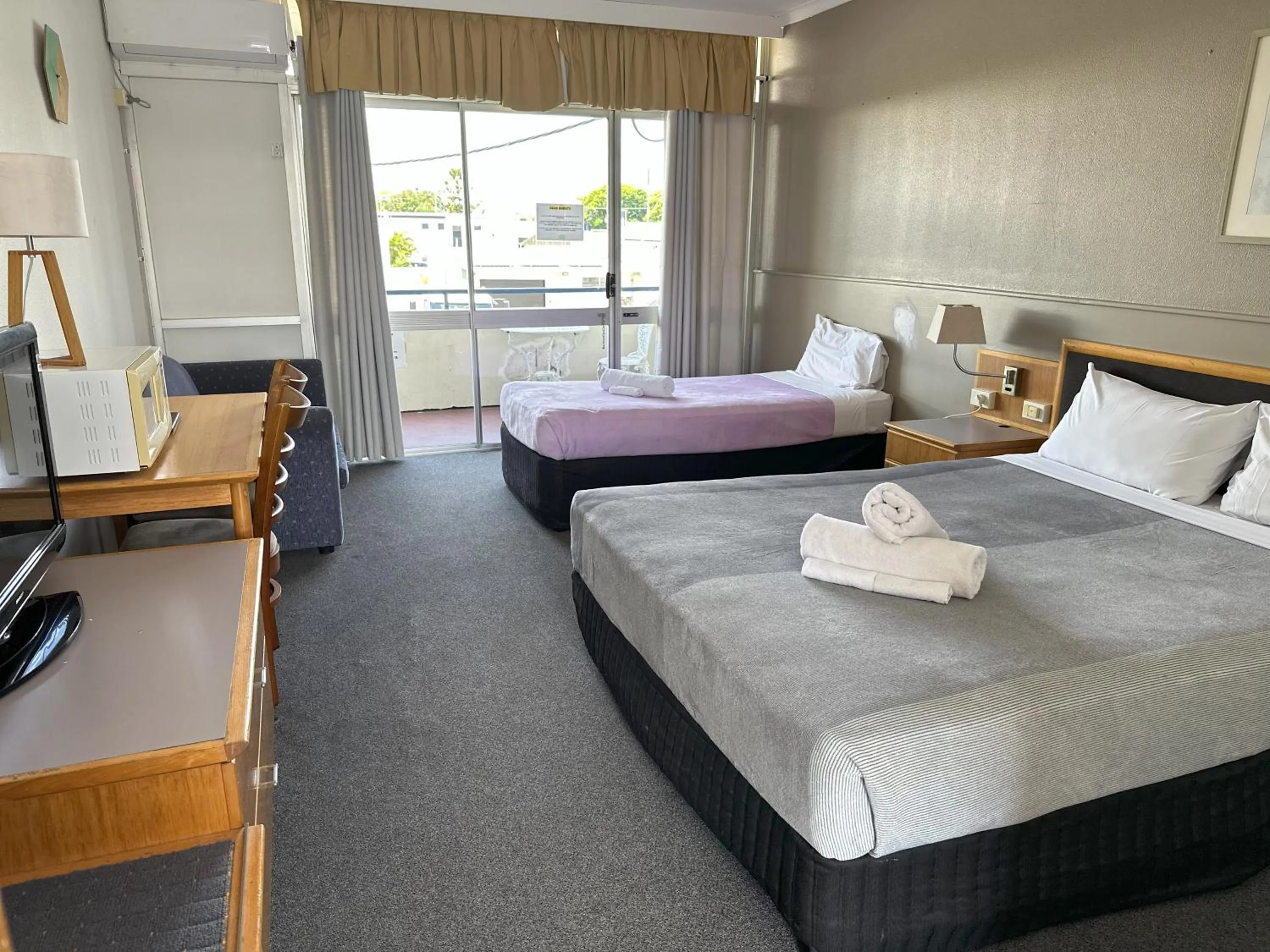 Bed in The Q Motel Rockhampton