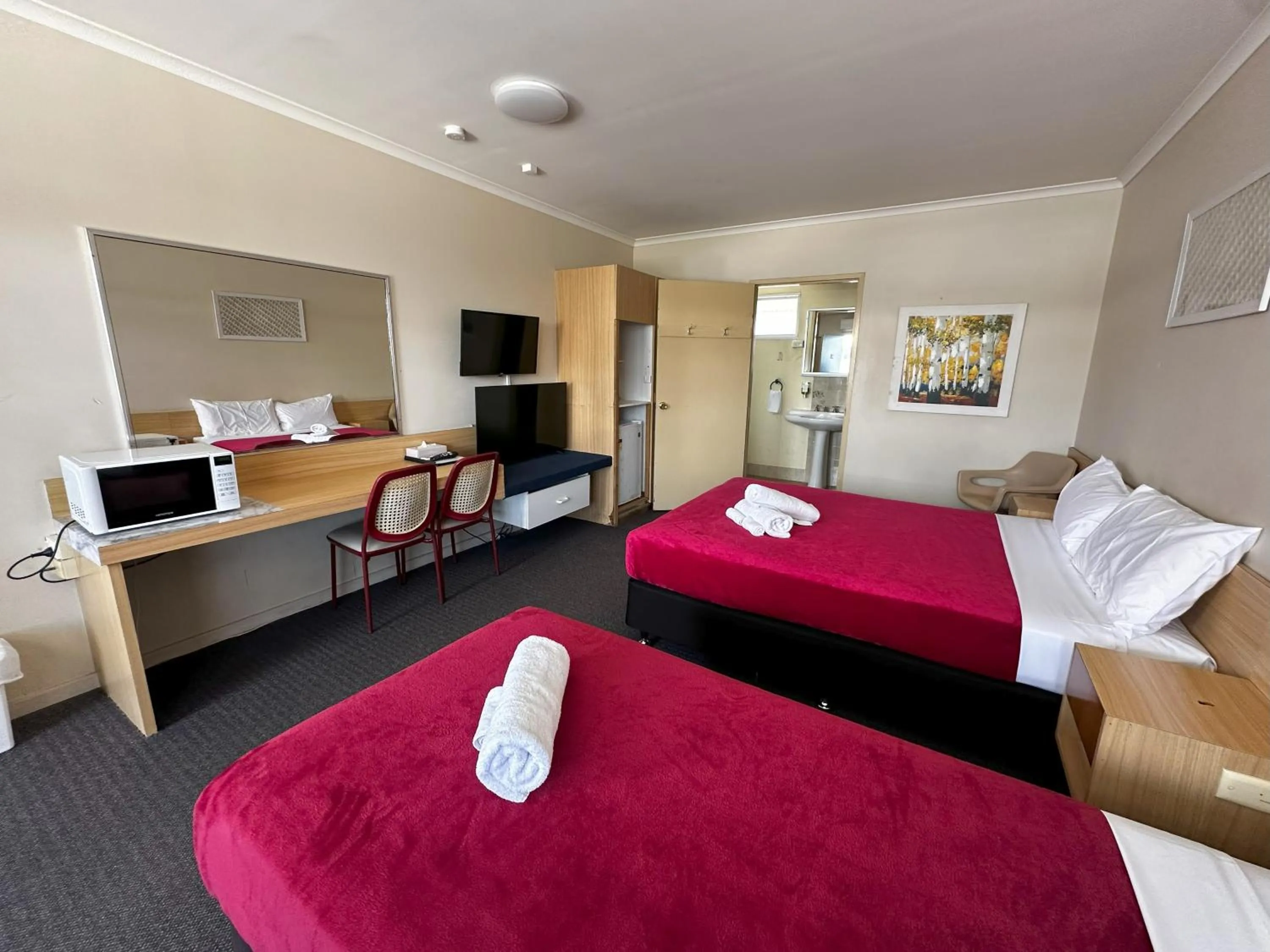 Bed in The Q Motel Rockhampton