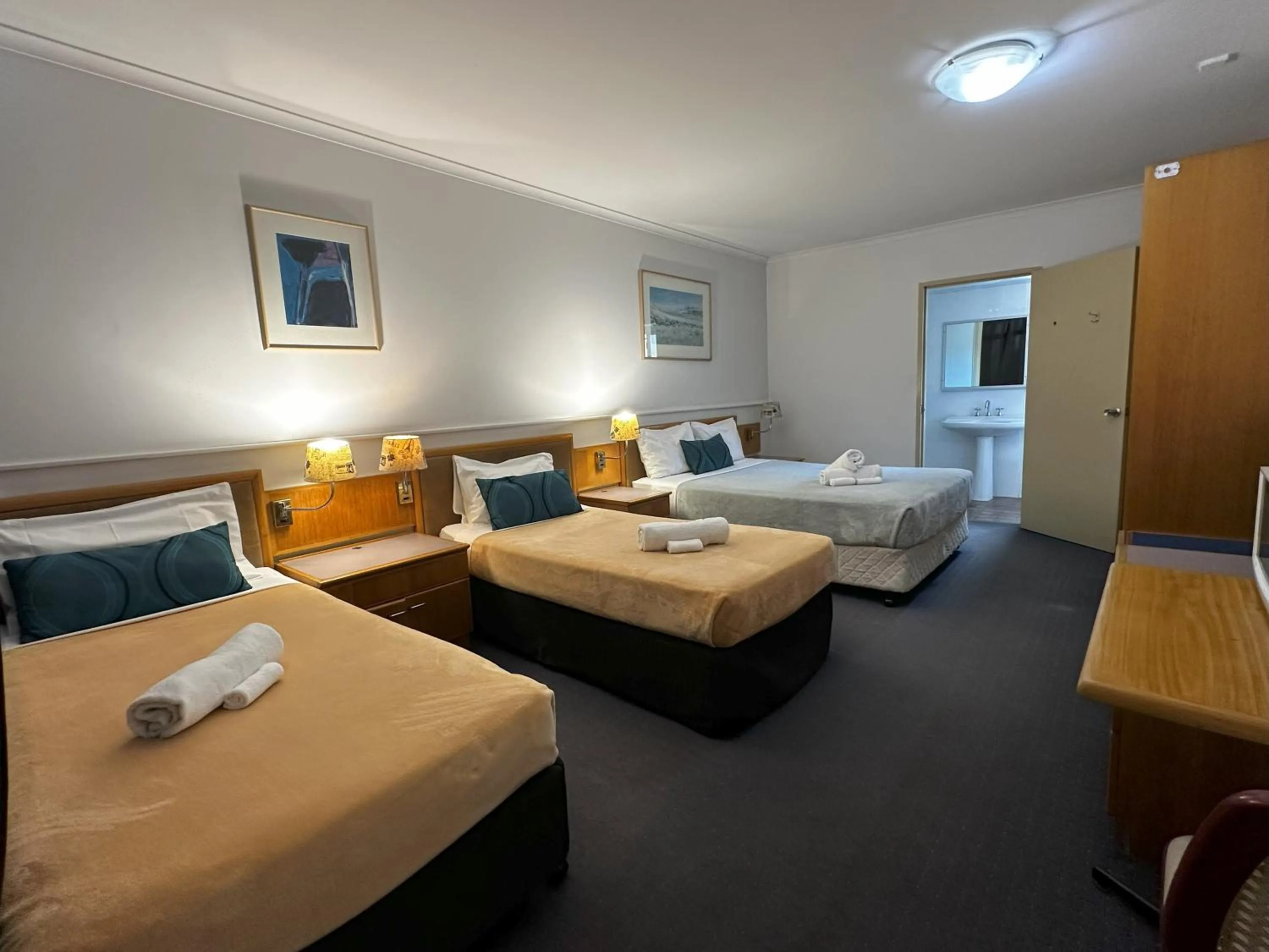 Bed in The Q Motel Rockhampton