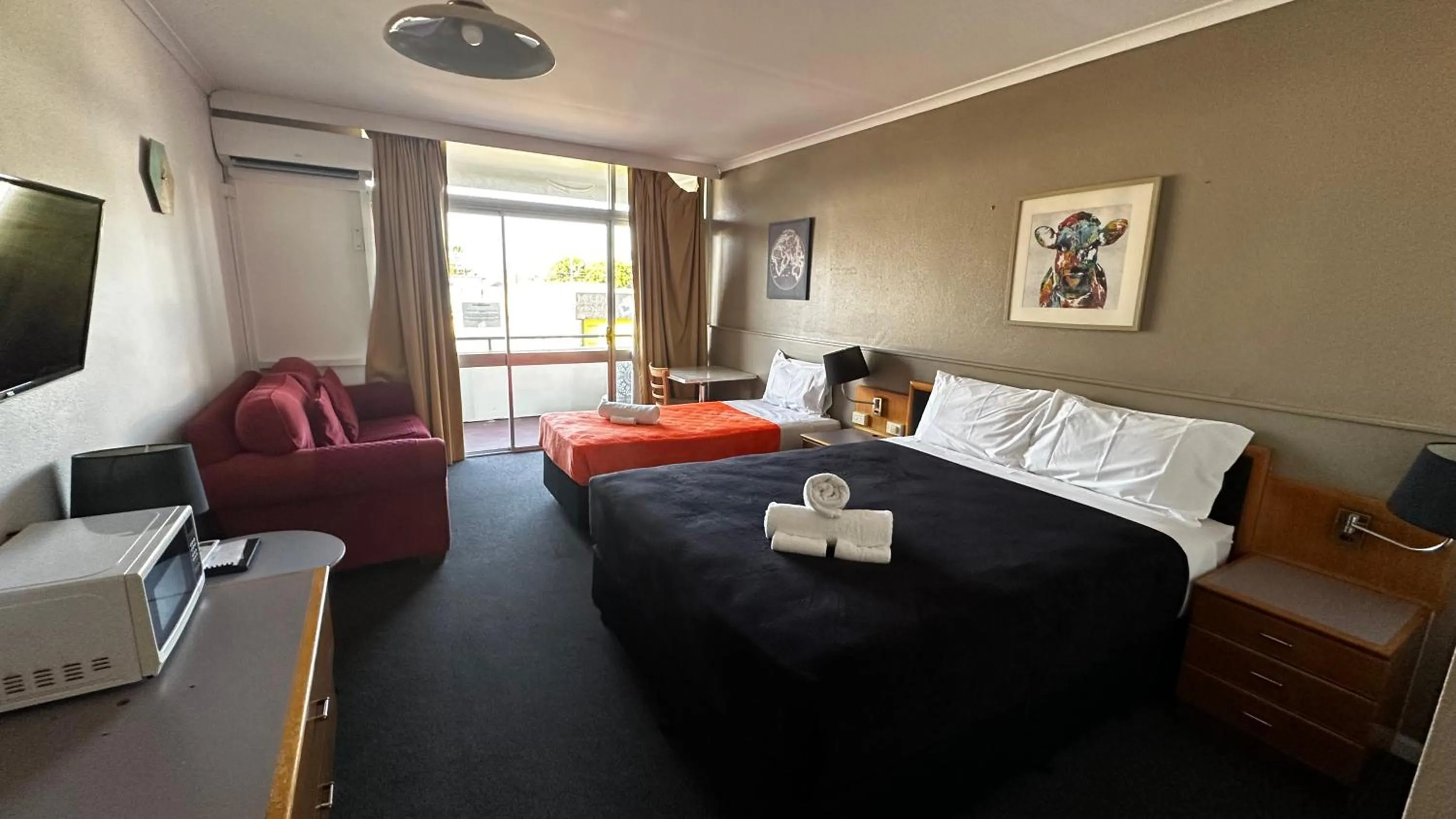 Bed in The Q Motel Rockhampton