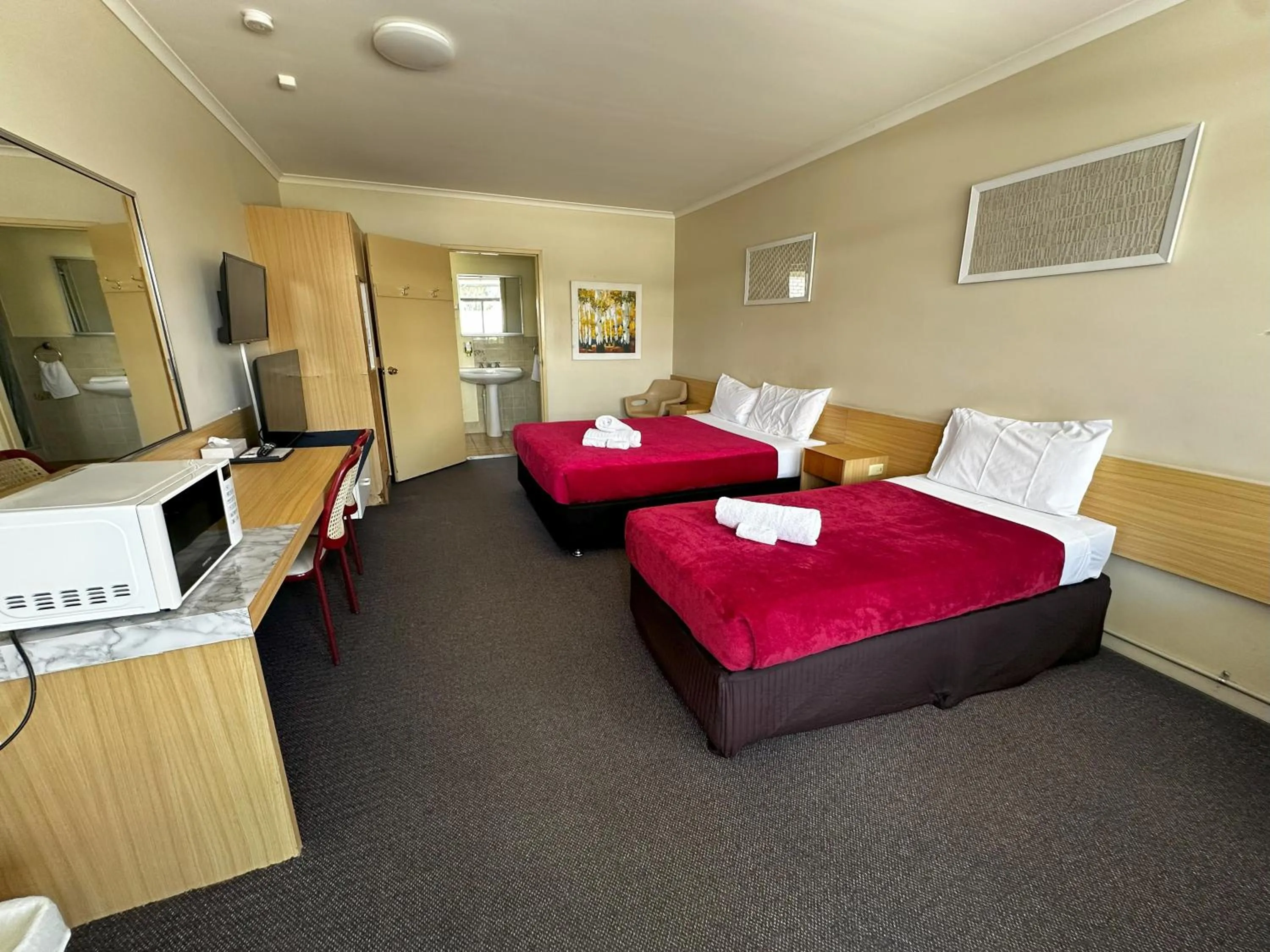 Bed in The Q Motel Rockhampton