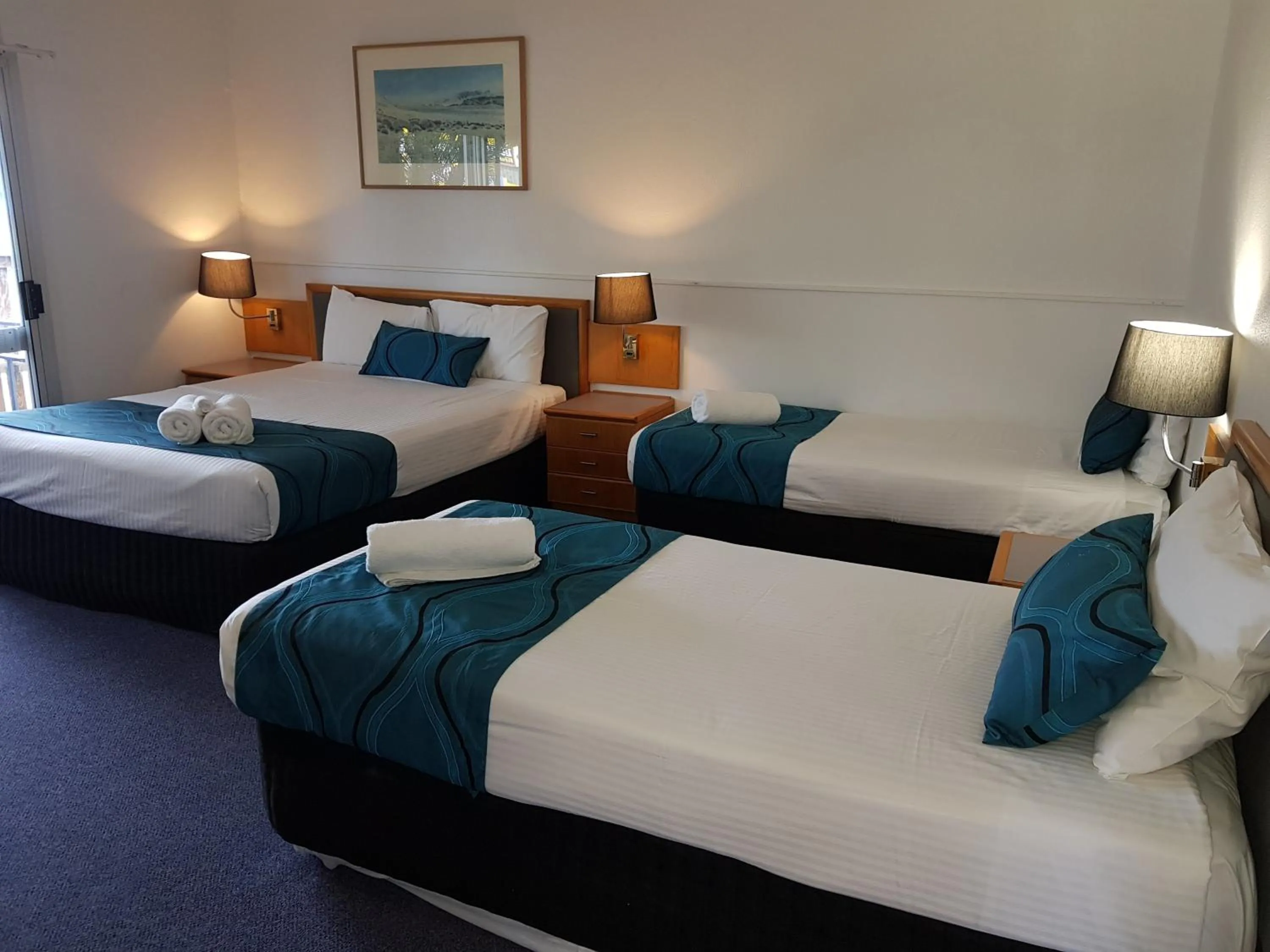 Bed in The Q Motel Rockhampton