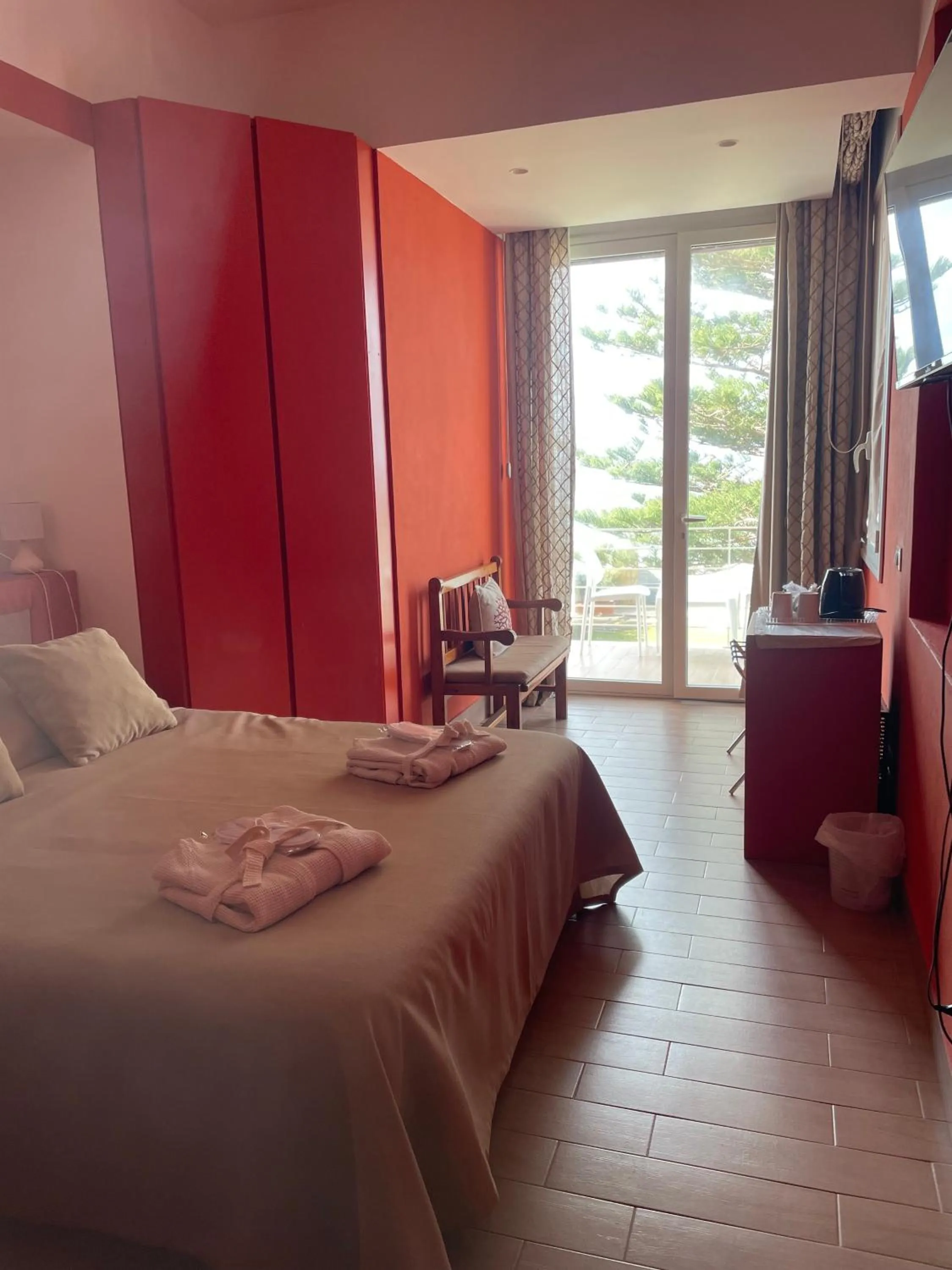 Bed in SUITEBEACH b&b and resort