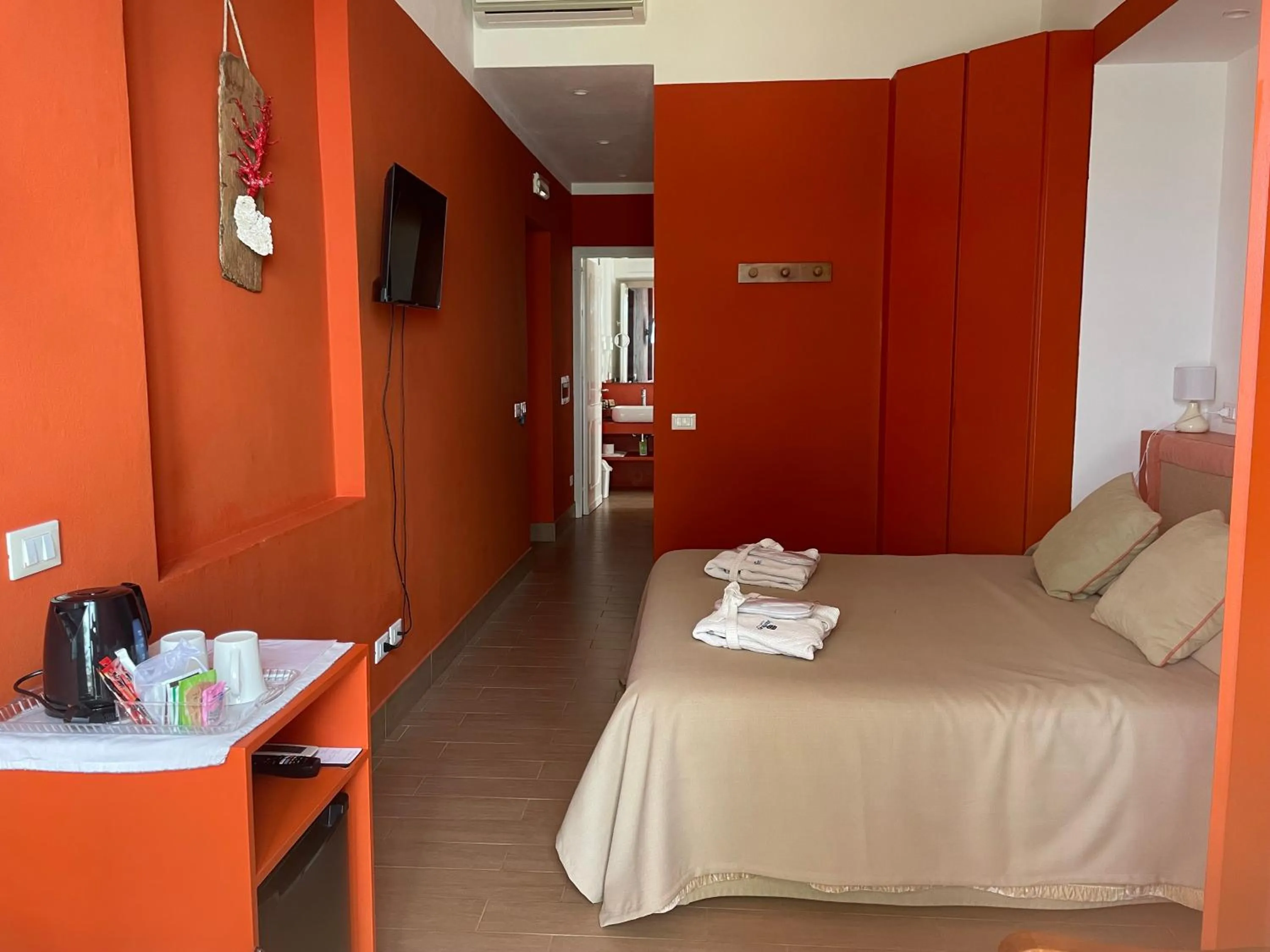 Bed in SUITEBEACH b&b and resort