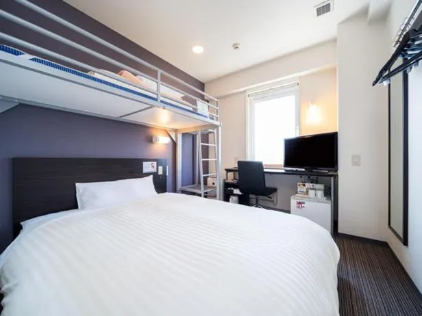 Bed in Super Hotel Hachinohe Tennen Onsen