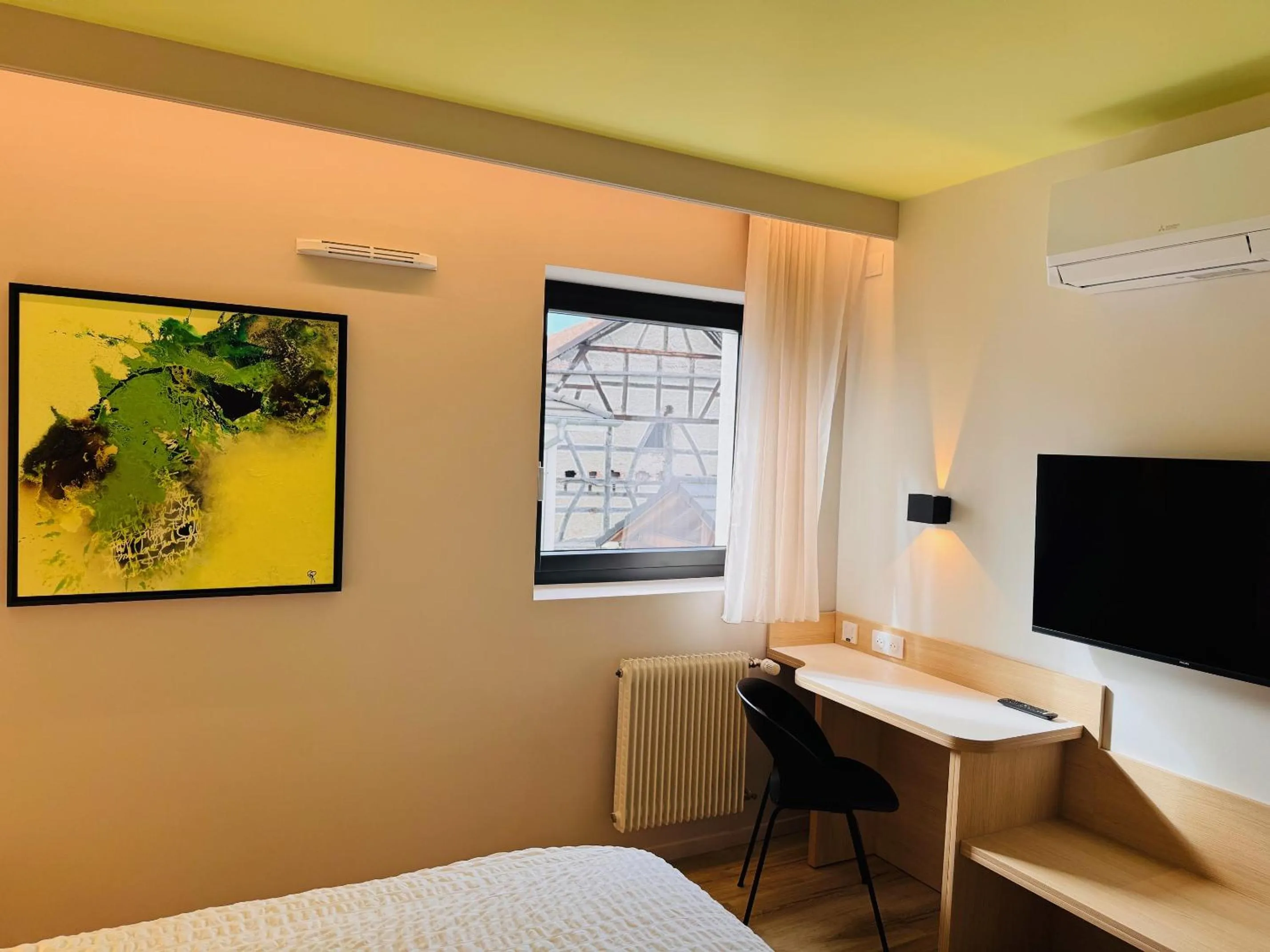 Bedroom, Bed in Logis Hôtel Restaurant Au Lion Rouge