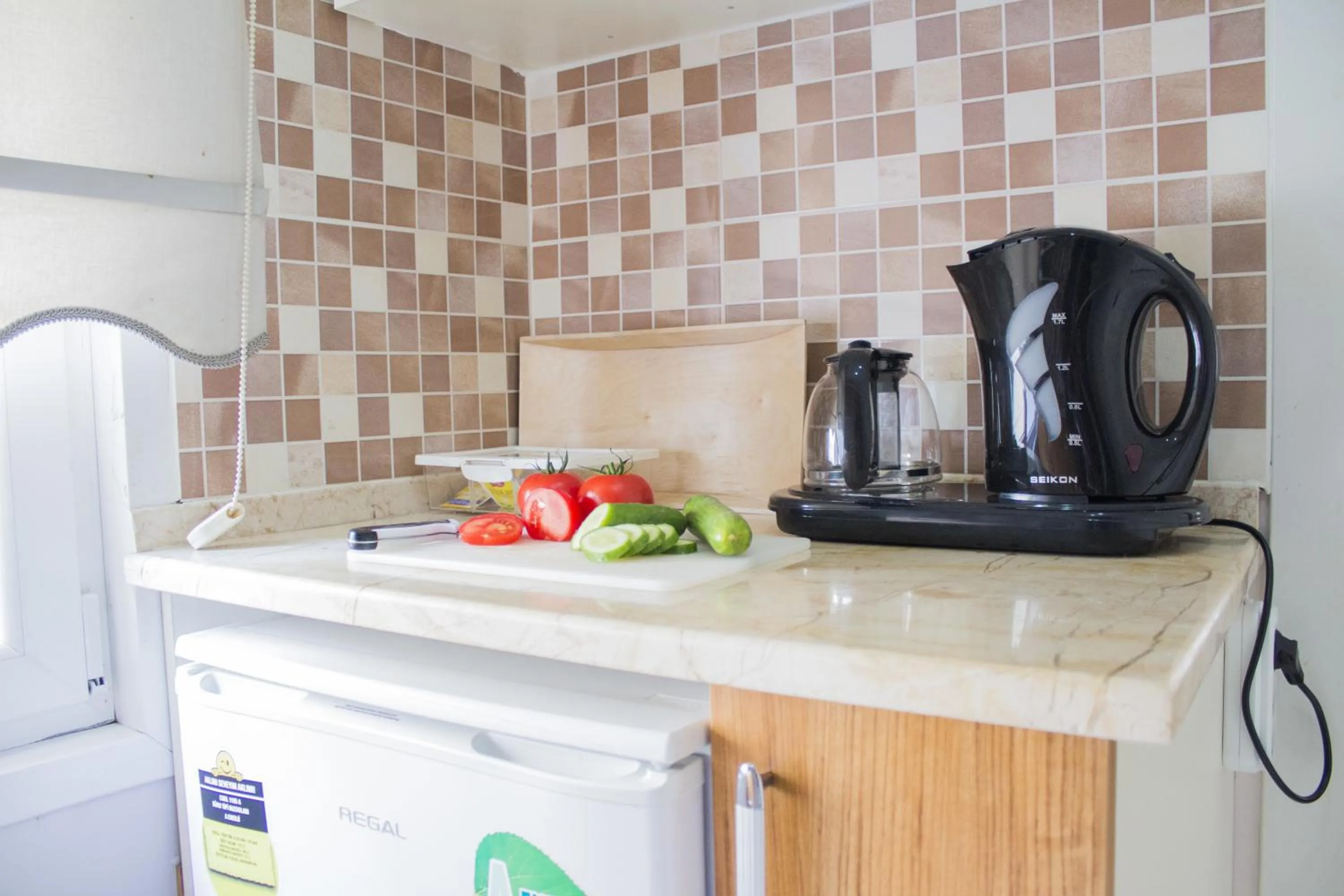 Kitchen or kitchenette in Feyza Apart