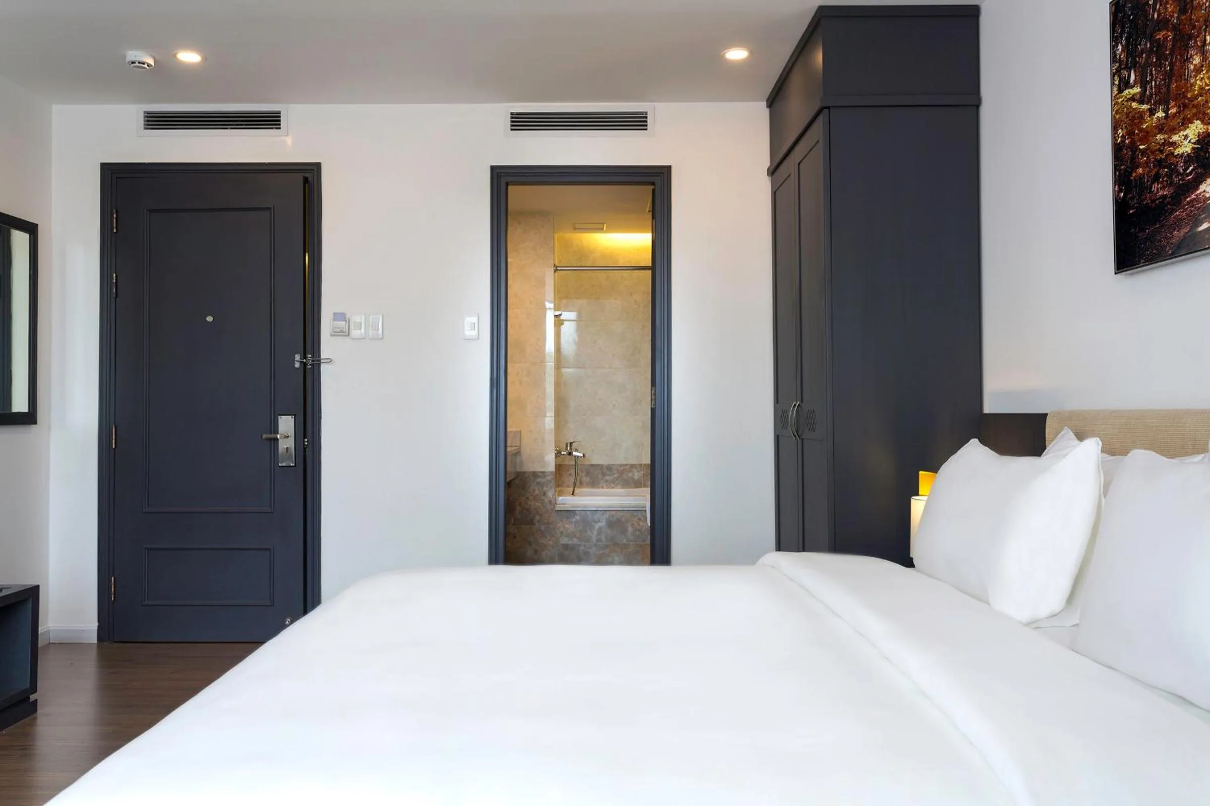 Photo of the whole room, Bed in Calista Sai Gon Hotel