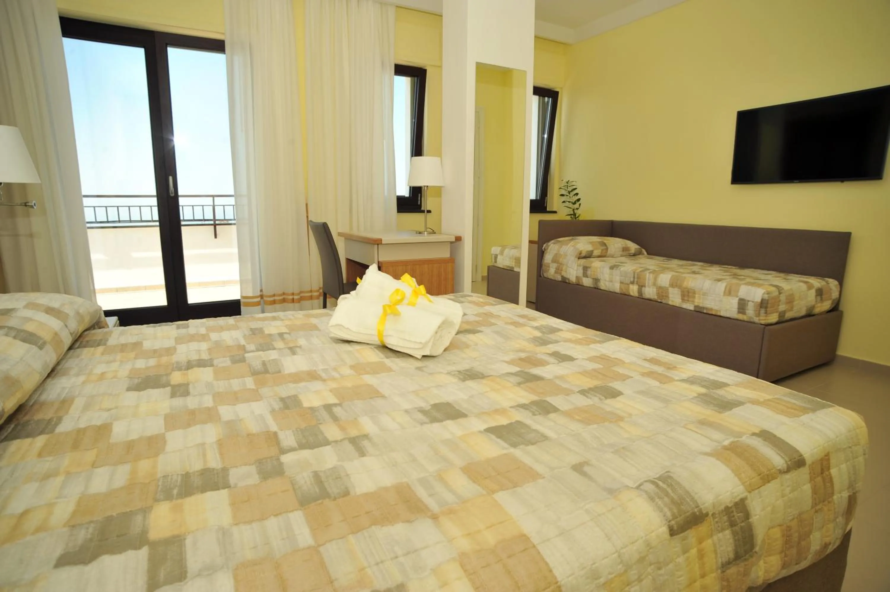 Bed in Villa Paradise Resort