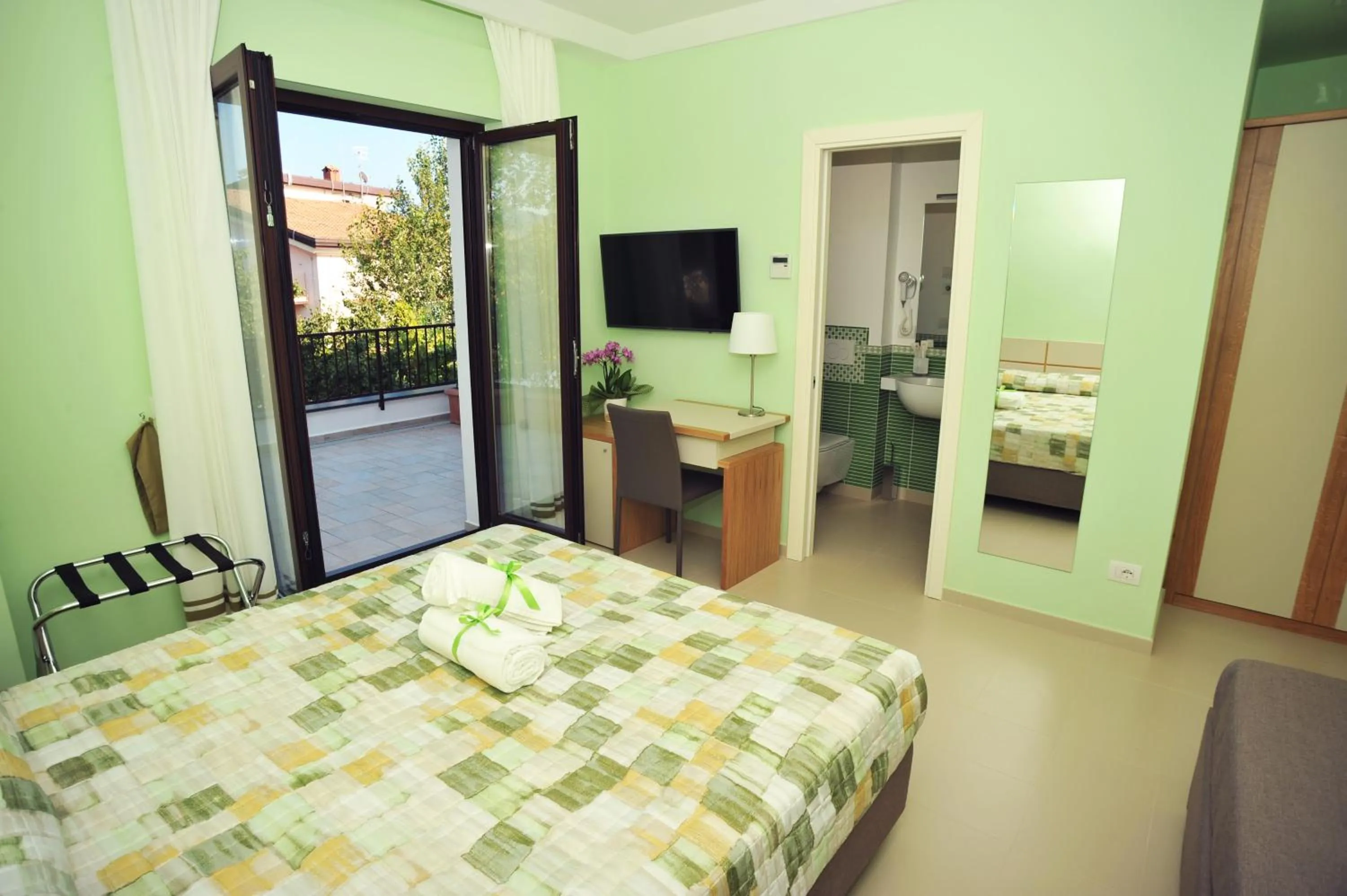 Bed in Villa Paradise Resort