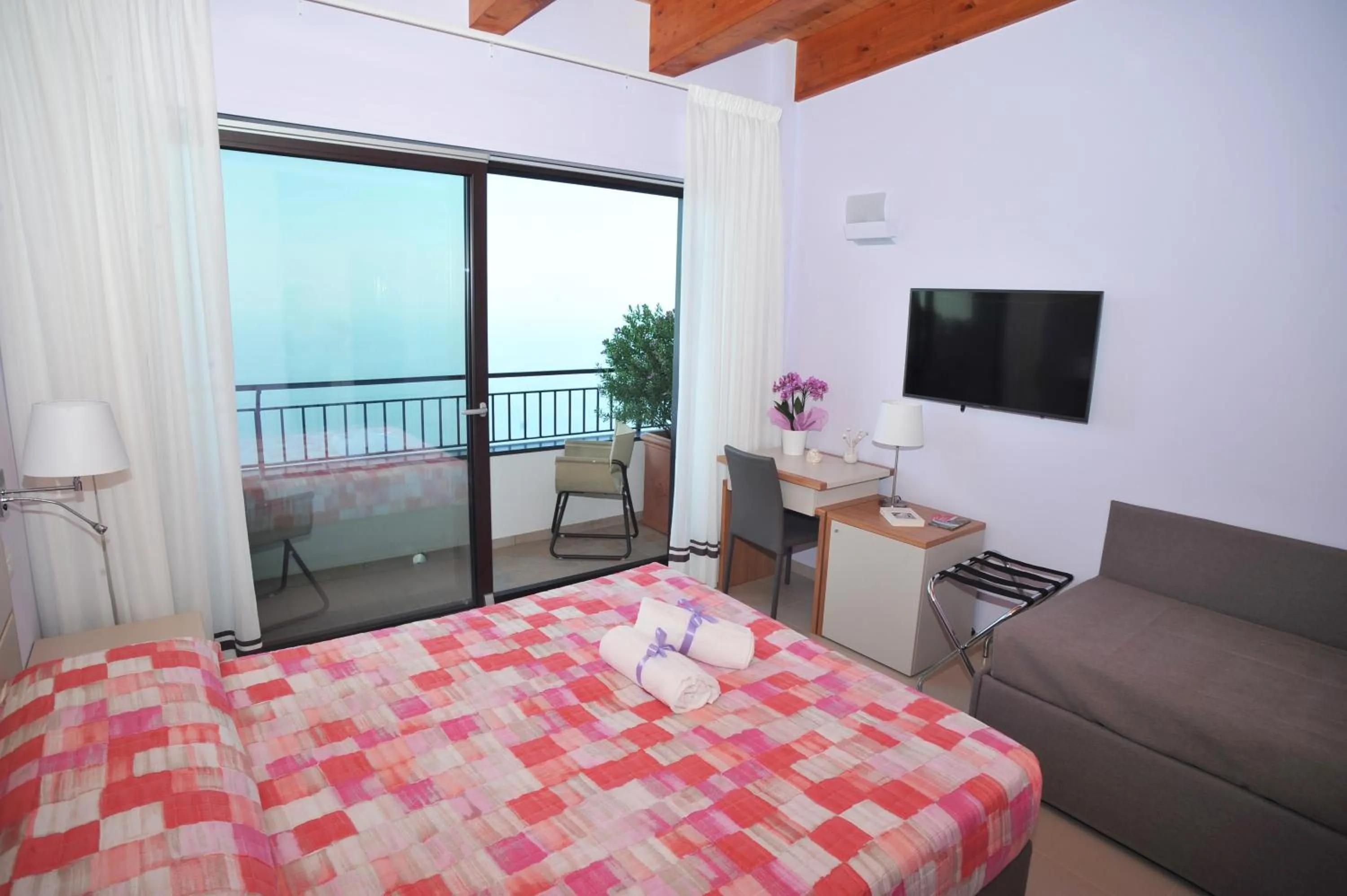 Bed in Villa Paradise Resort