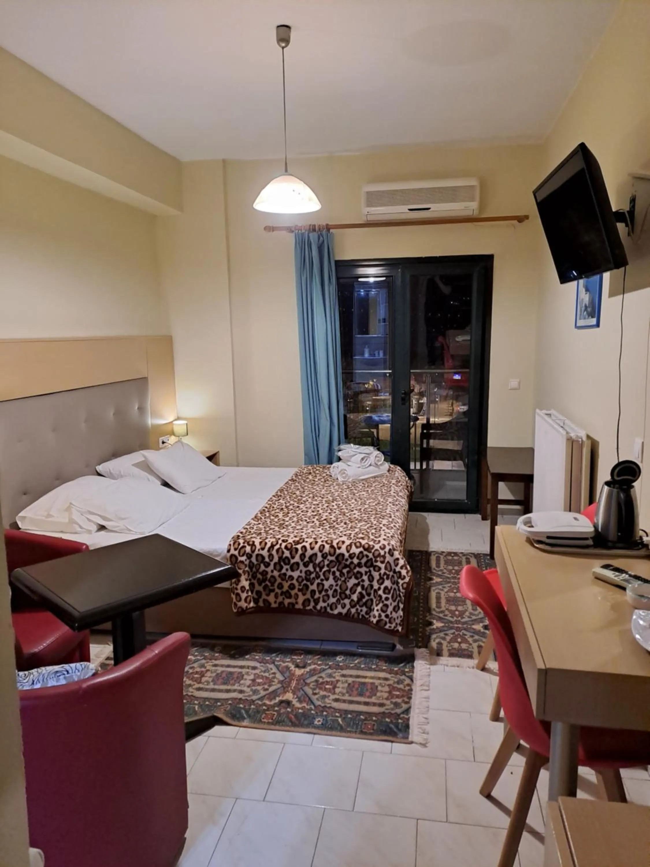 Bed in Parthenon Hotel