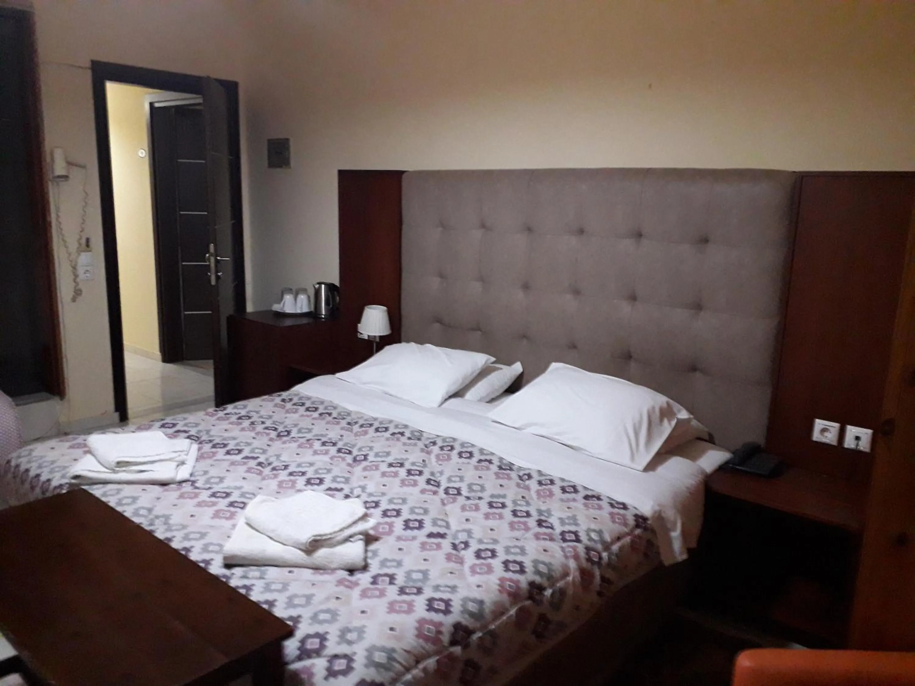 Bed in Parthenon Hotel