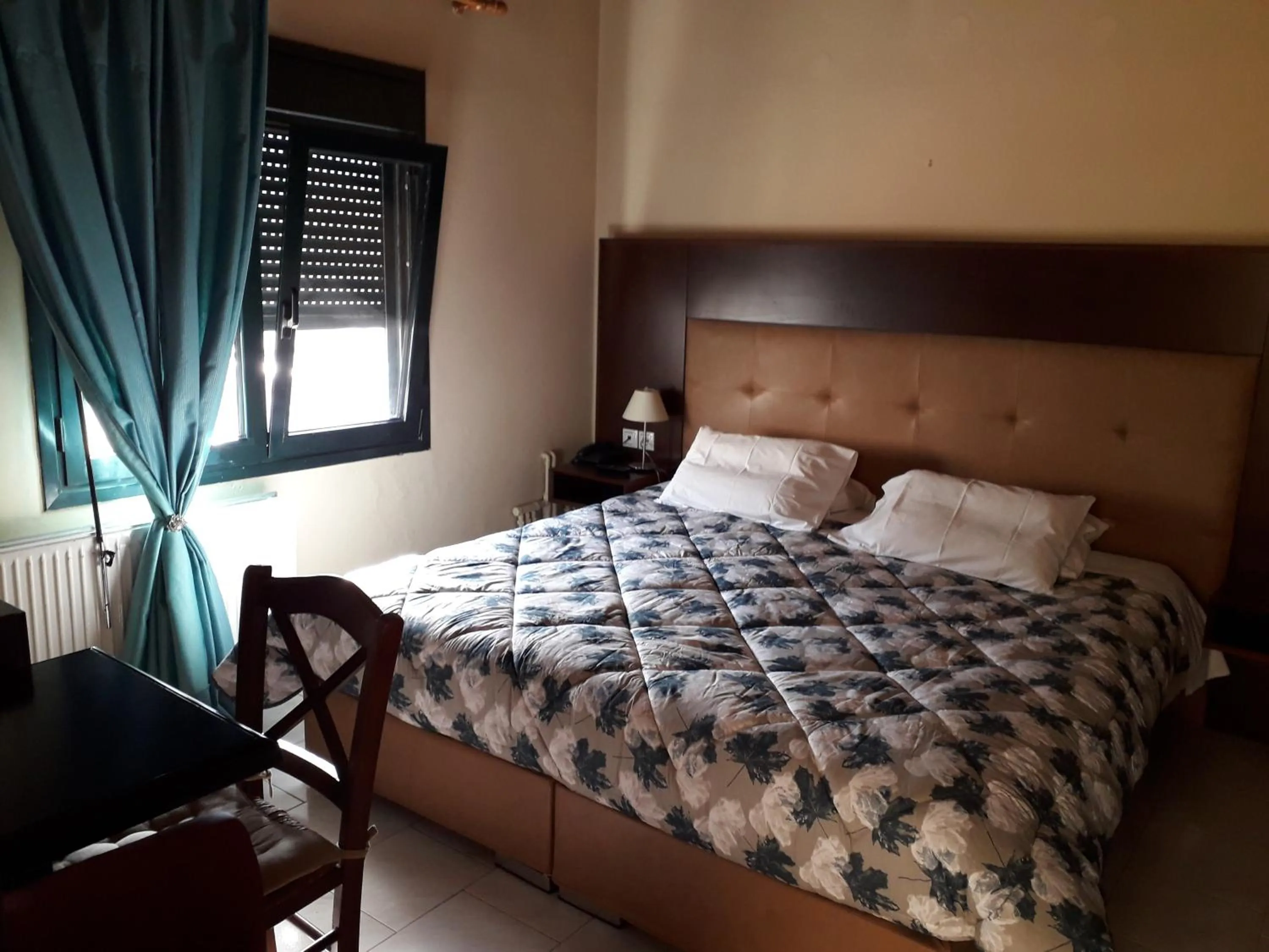 Bed in Parthenon Hotel