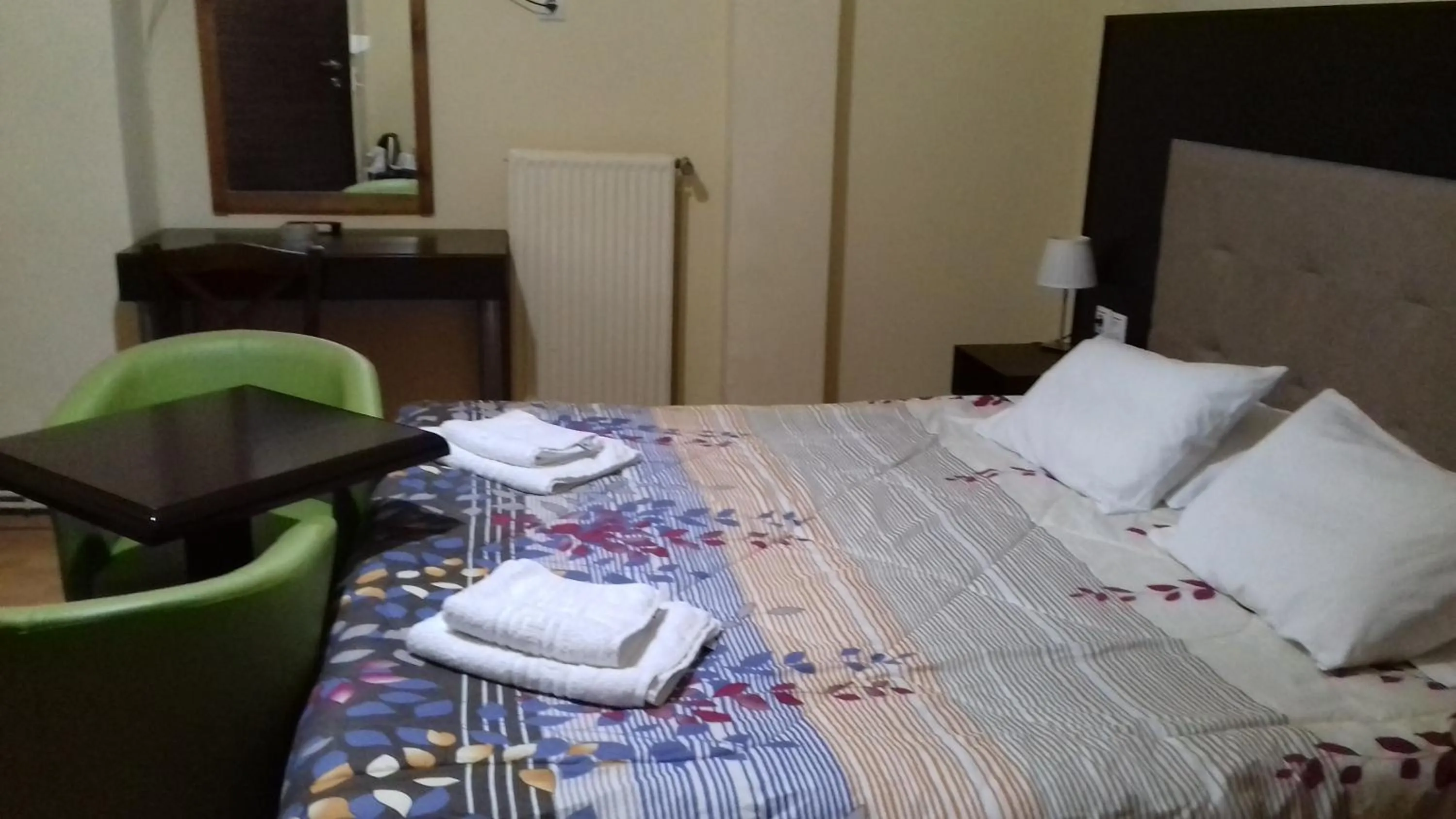 Bed in Parthenon Hotel