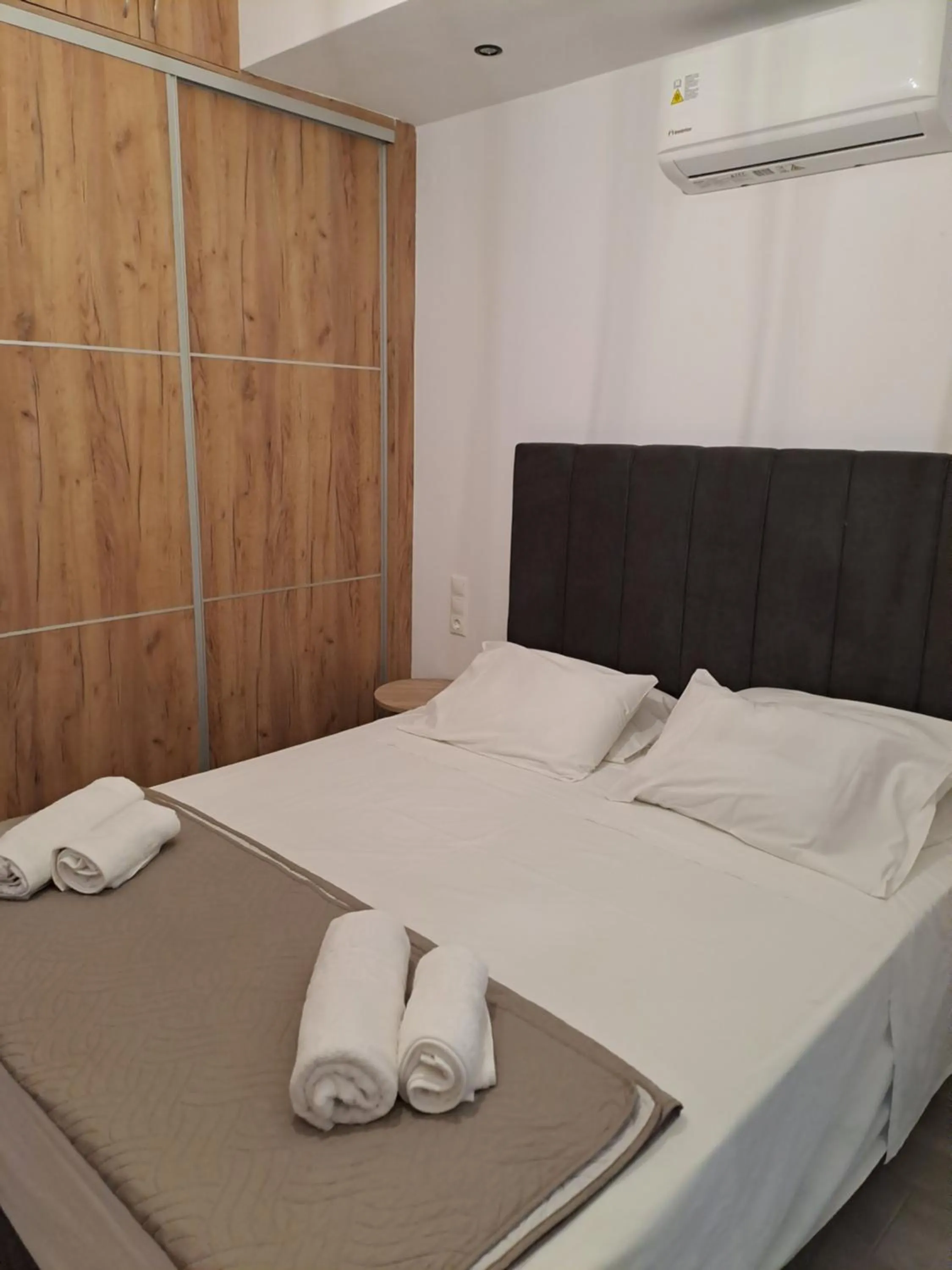 Bed in Parthenon Hotel