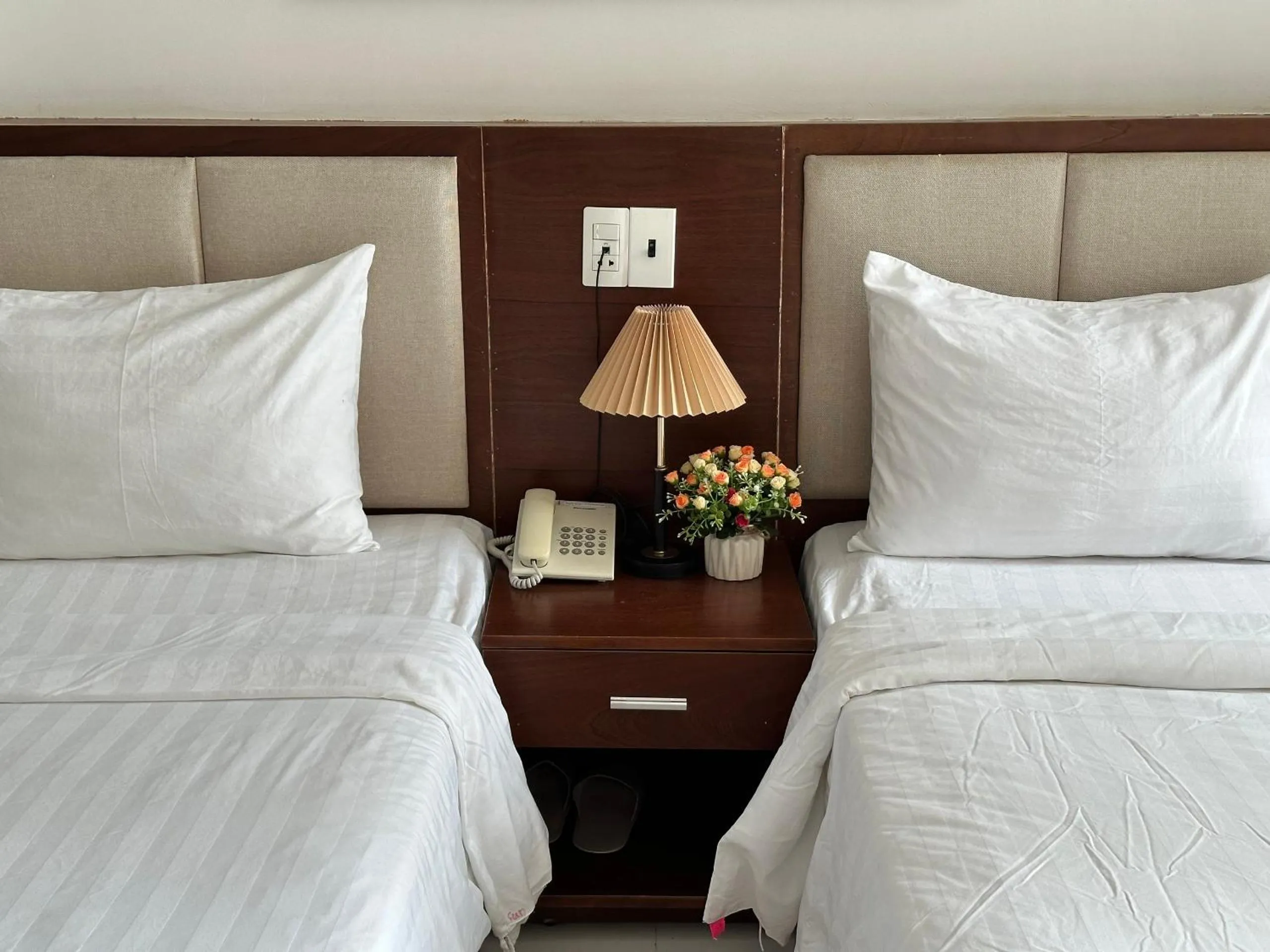 Bed in New Era Hotel & Apartments