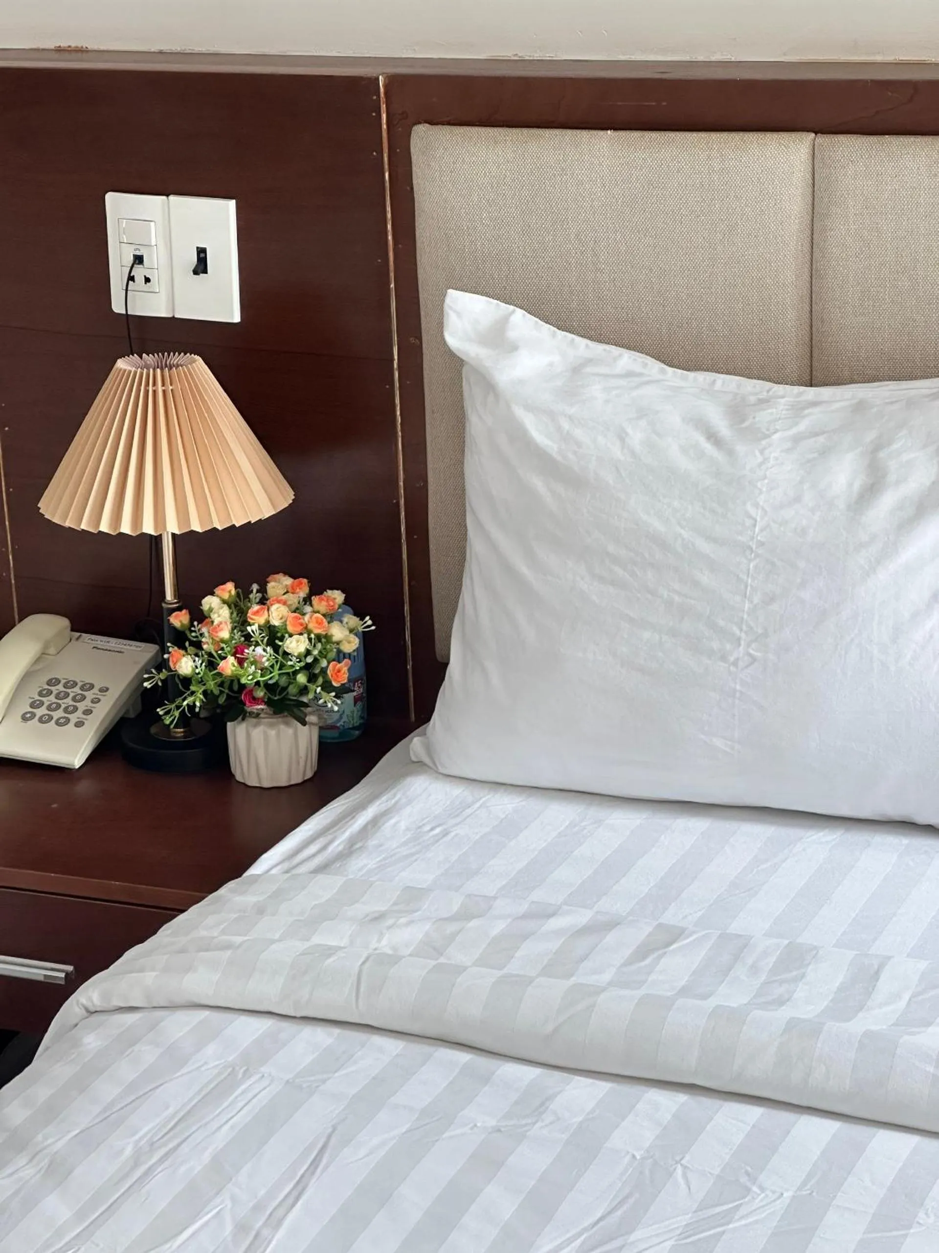 Bed in New Era Hotel & Apartments