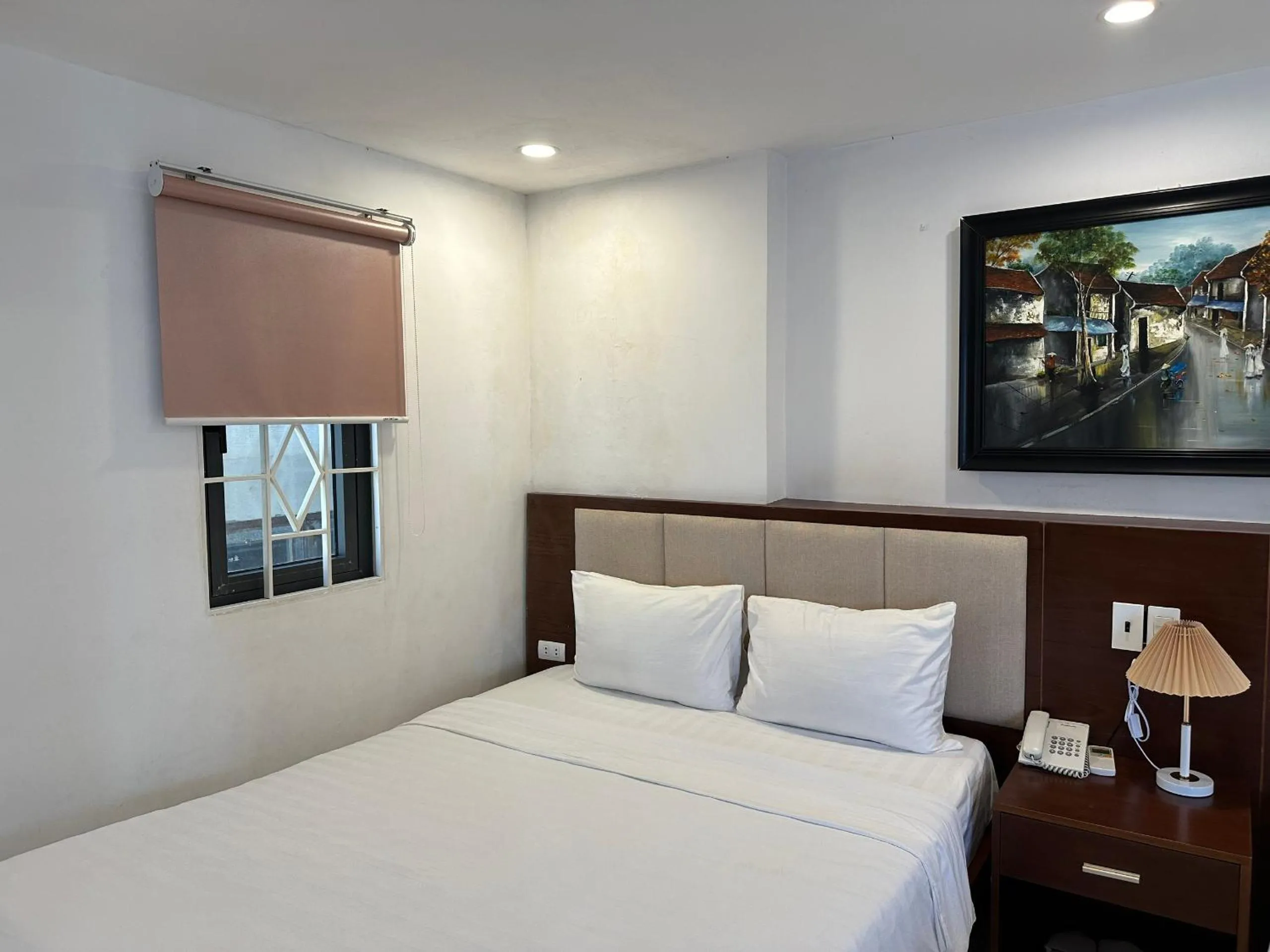Bed in New Era Hotel & Apartments