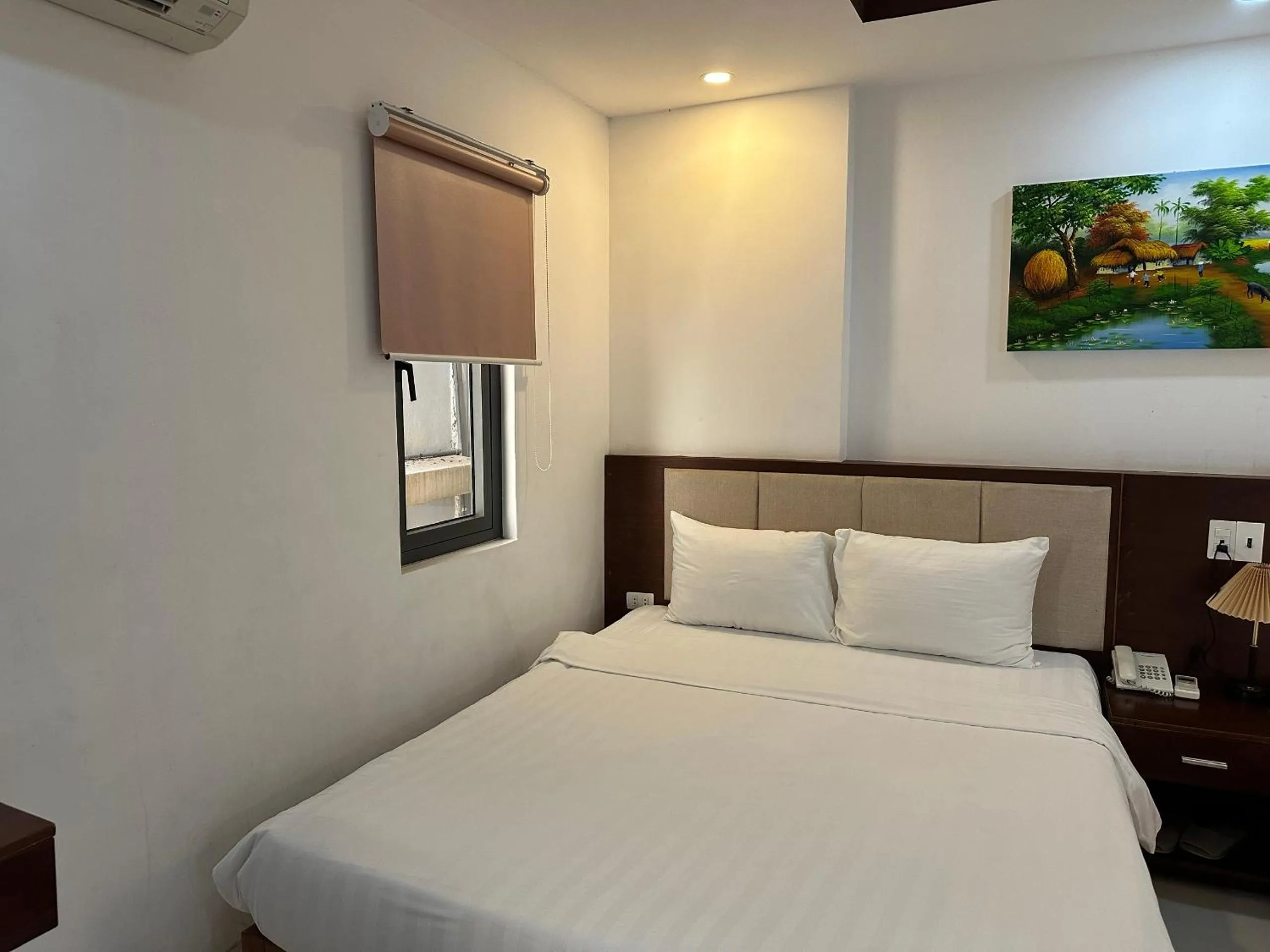 Bed in New Era Hotel & Apartments