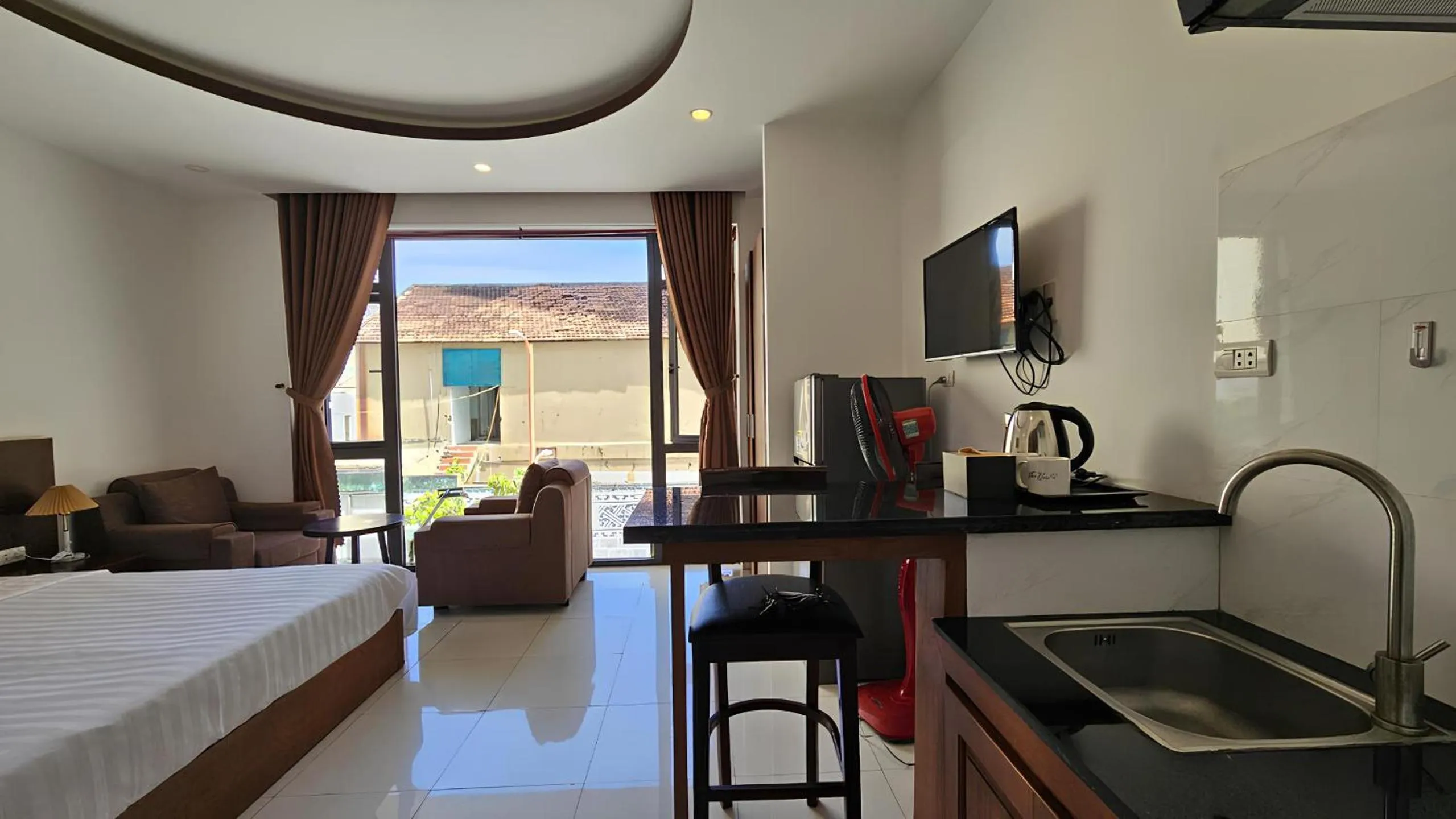 Bed in New Era Hotel & Apartments