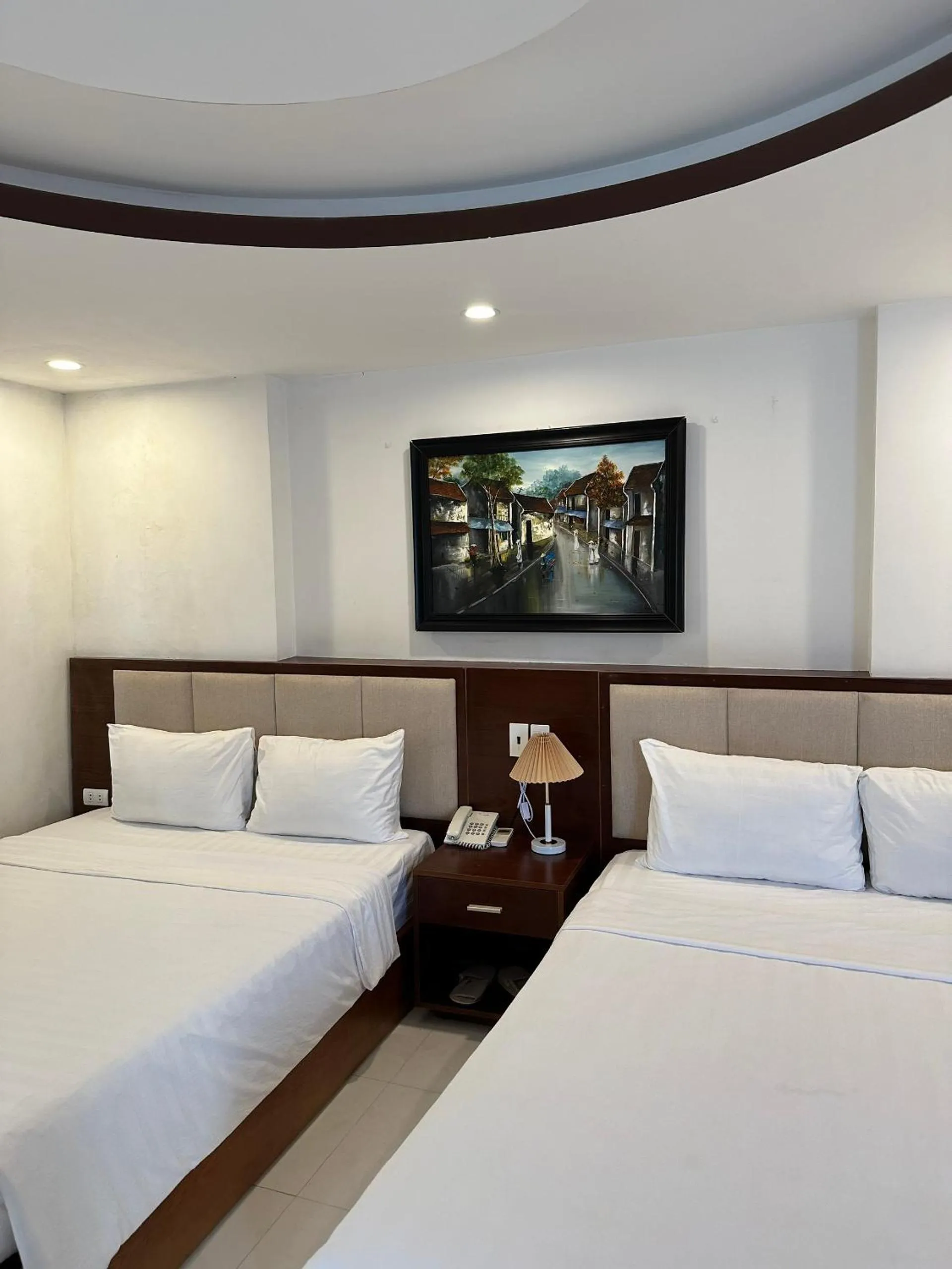 Bed in New Era Hotel & Apartments