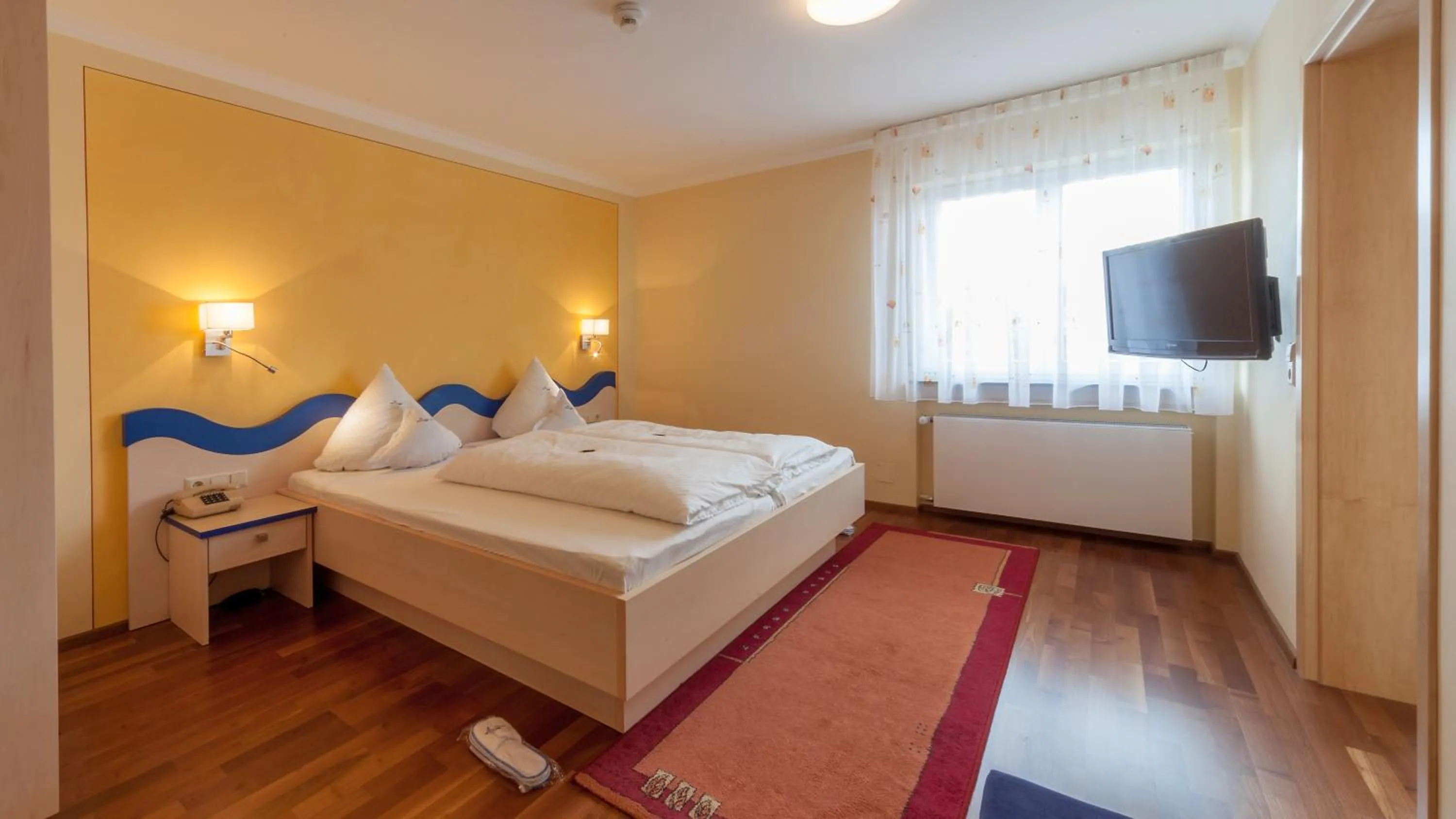 Bed in Hotel Meschenmoser