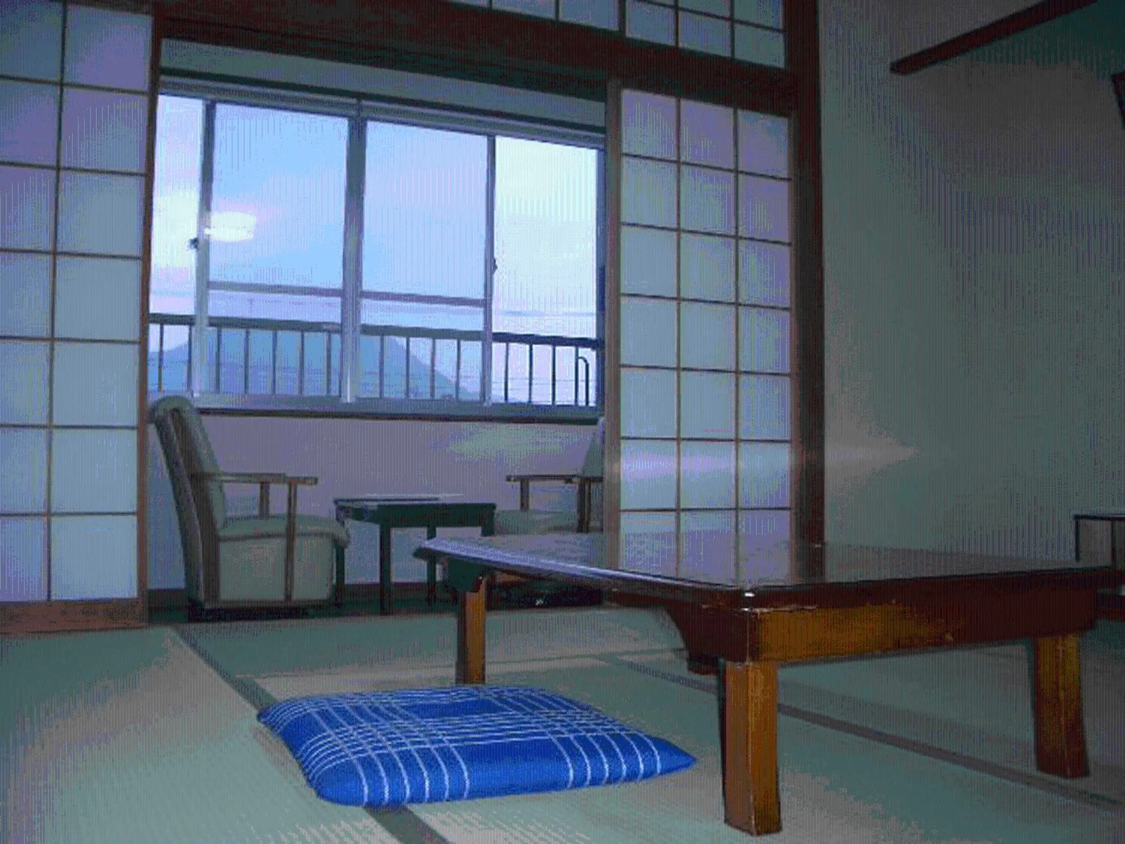 Seating area in Family Ryokan Kawakyu with Showa Retro, private hot spring
