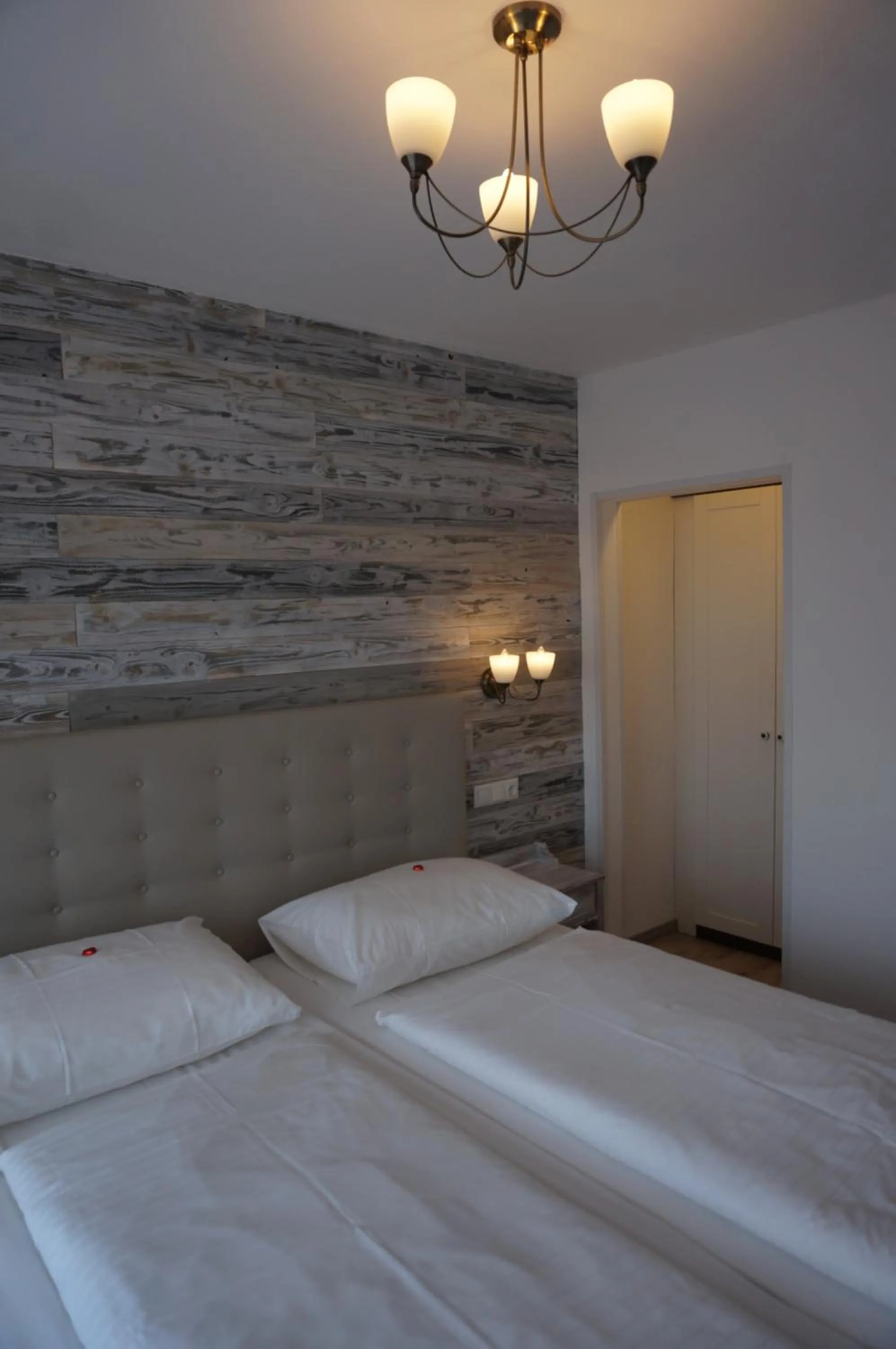 Decorative detail, Bed in Hotel Diana Garni