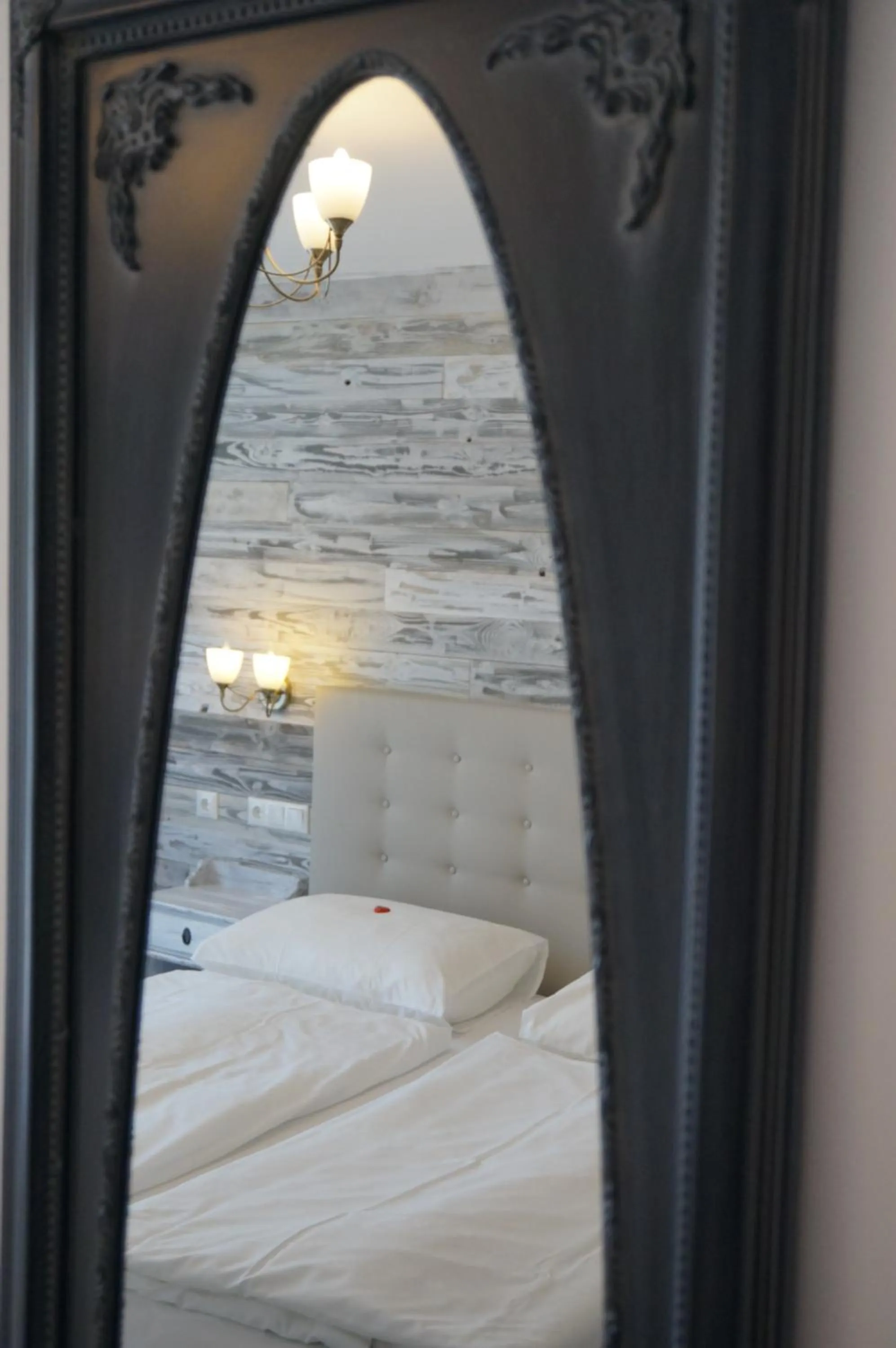 Decorative detail, Bed in Hotel Diana Garni