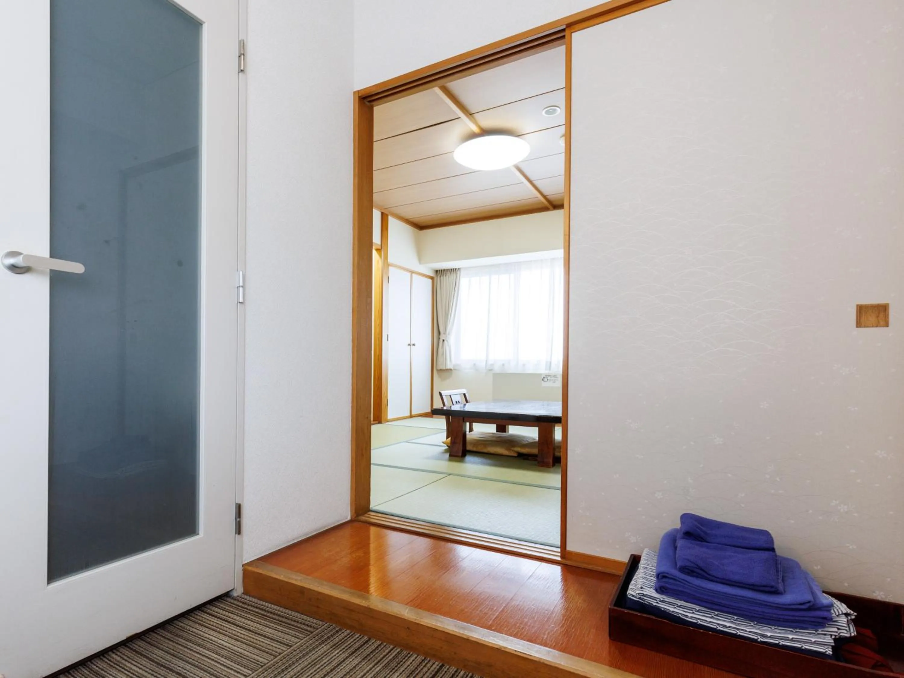 Bed in Tabist Hotel Nemuro Kaiyoutei