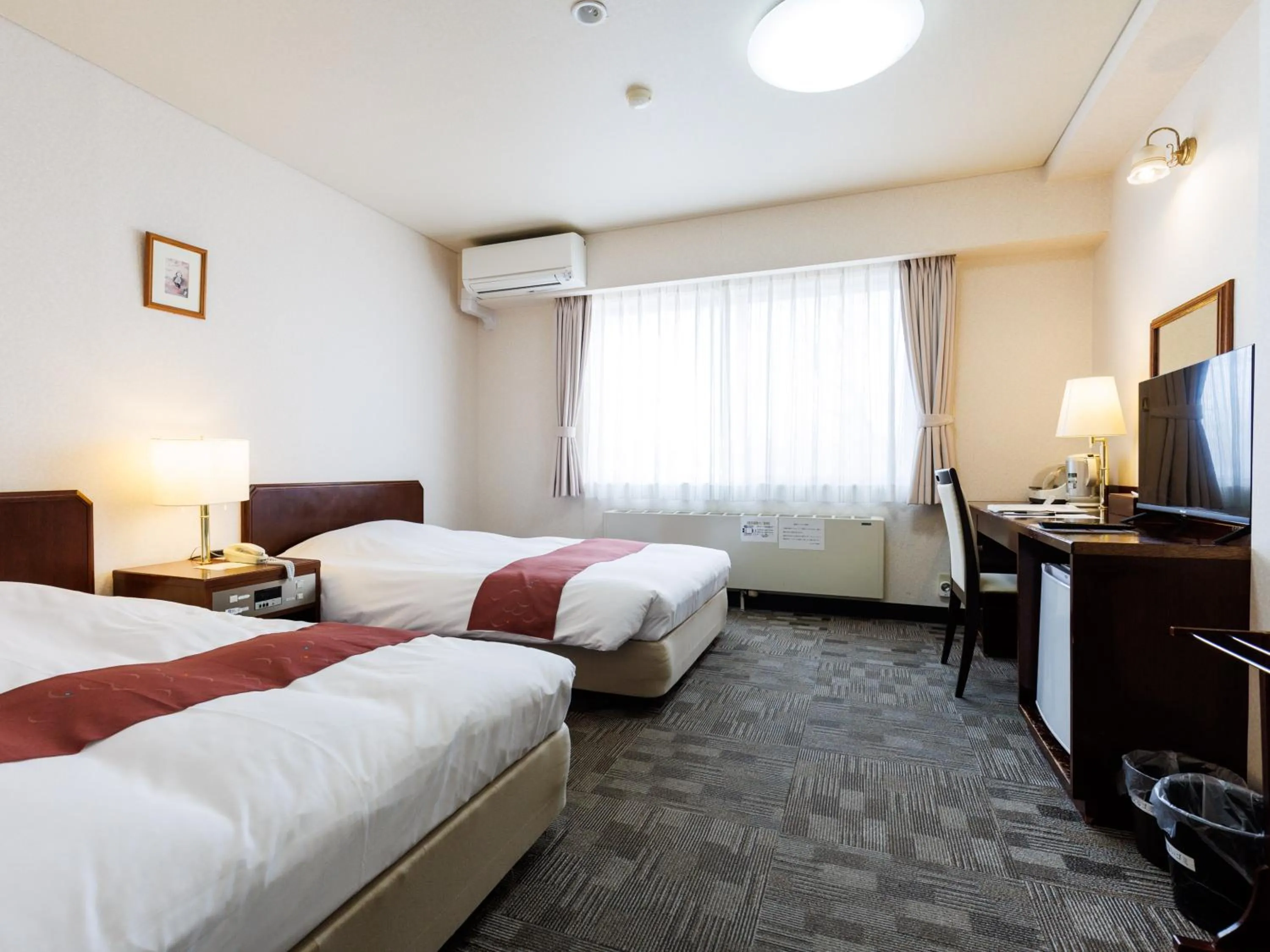 Photo of the whole room, Bed in Tabist Hotel Nemuro Kaiyoutei