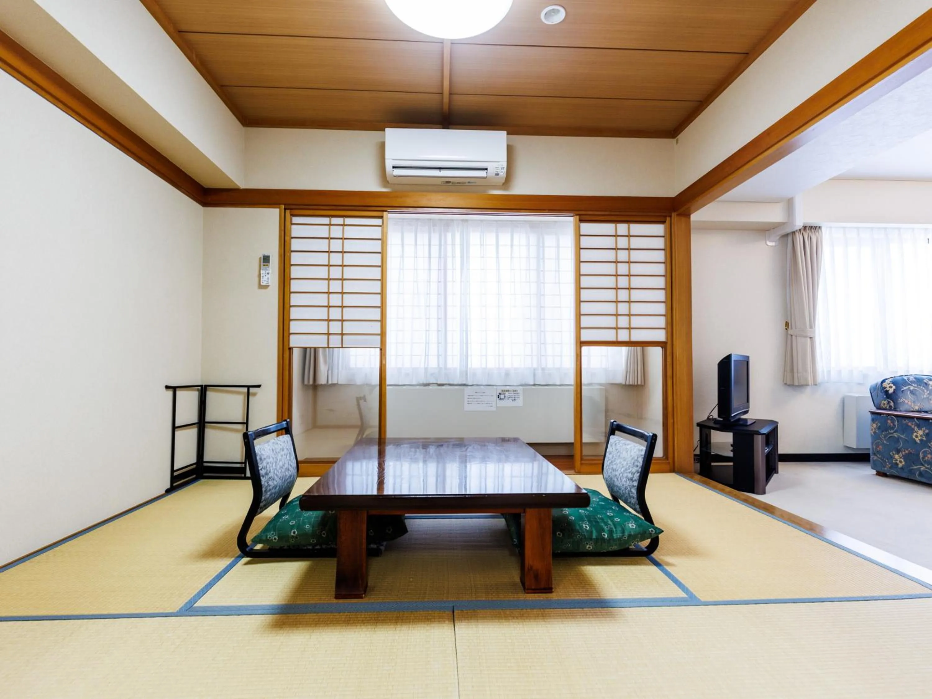 Bed in Tabist Hotel Nemuro Kaiyoutei