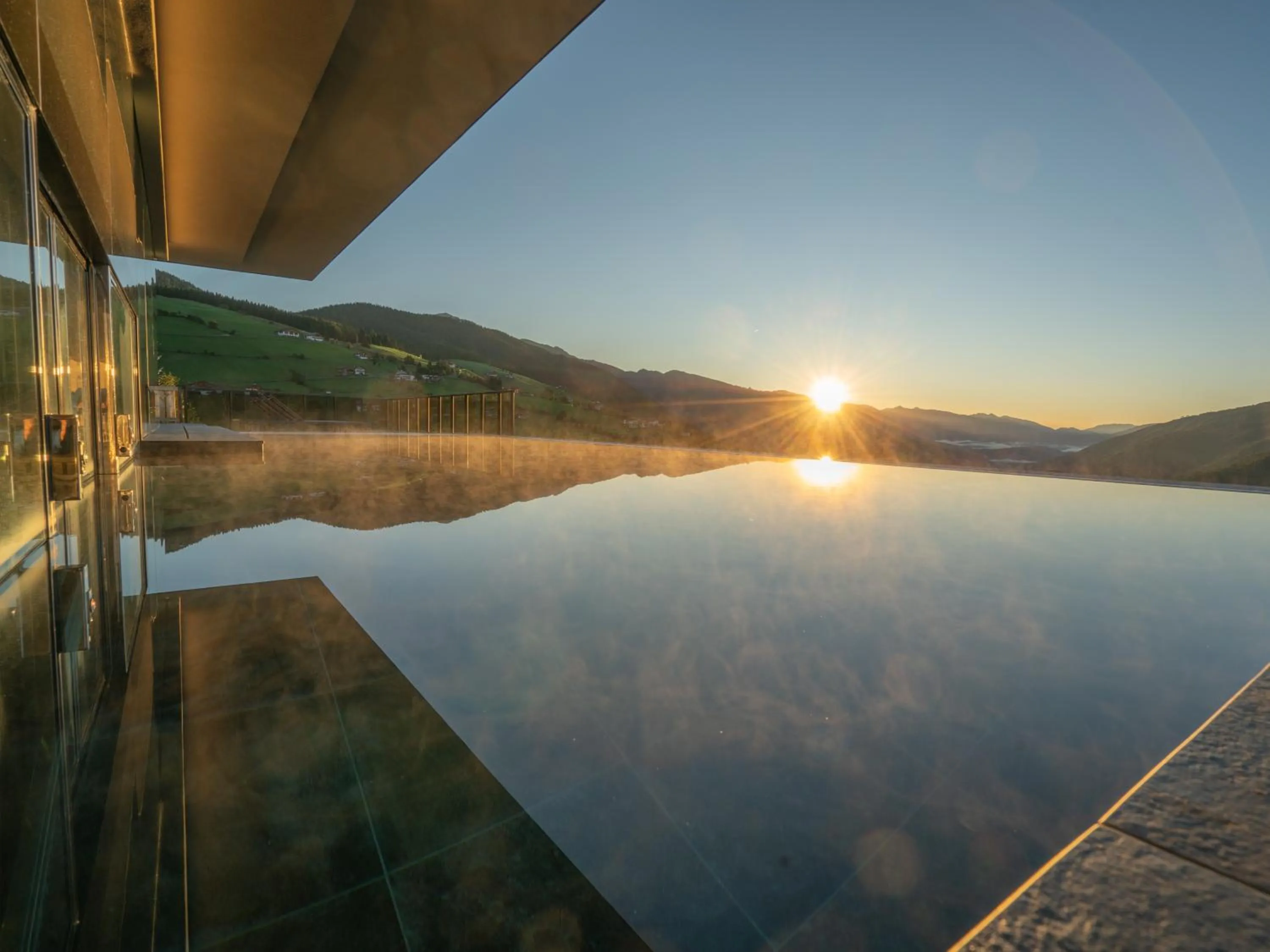 Swimming pool in Hotel Purvita by Oberlechner