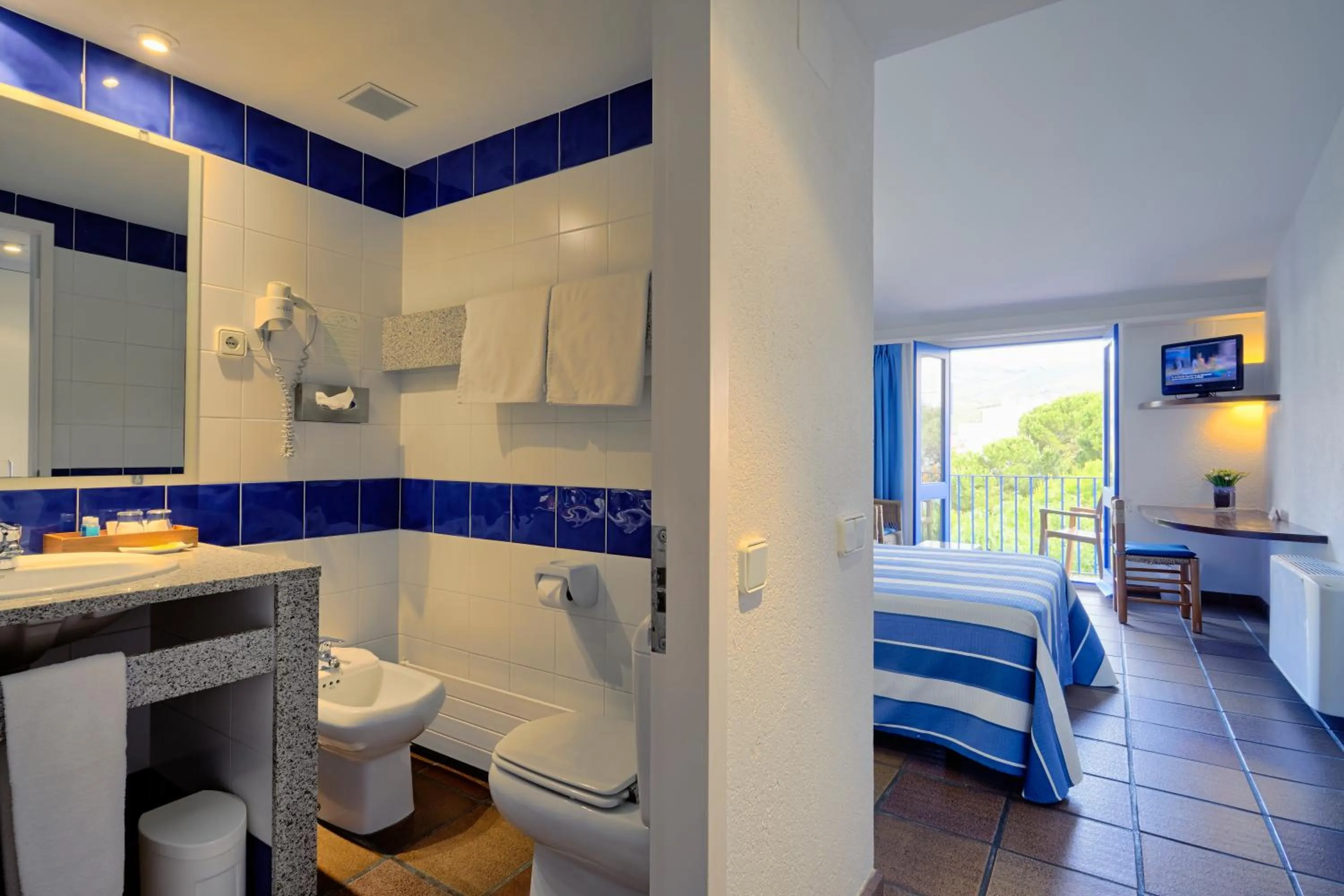 Bathroom, Bed in Hotel Blaumar Cadaqués by Fimedhotels
